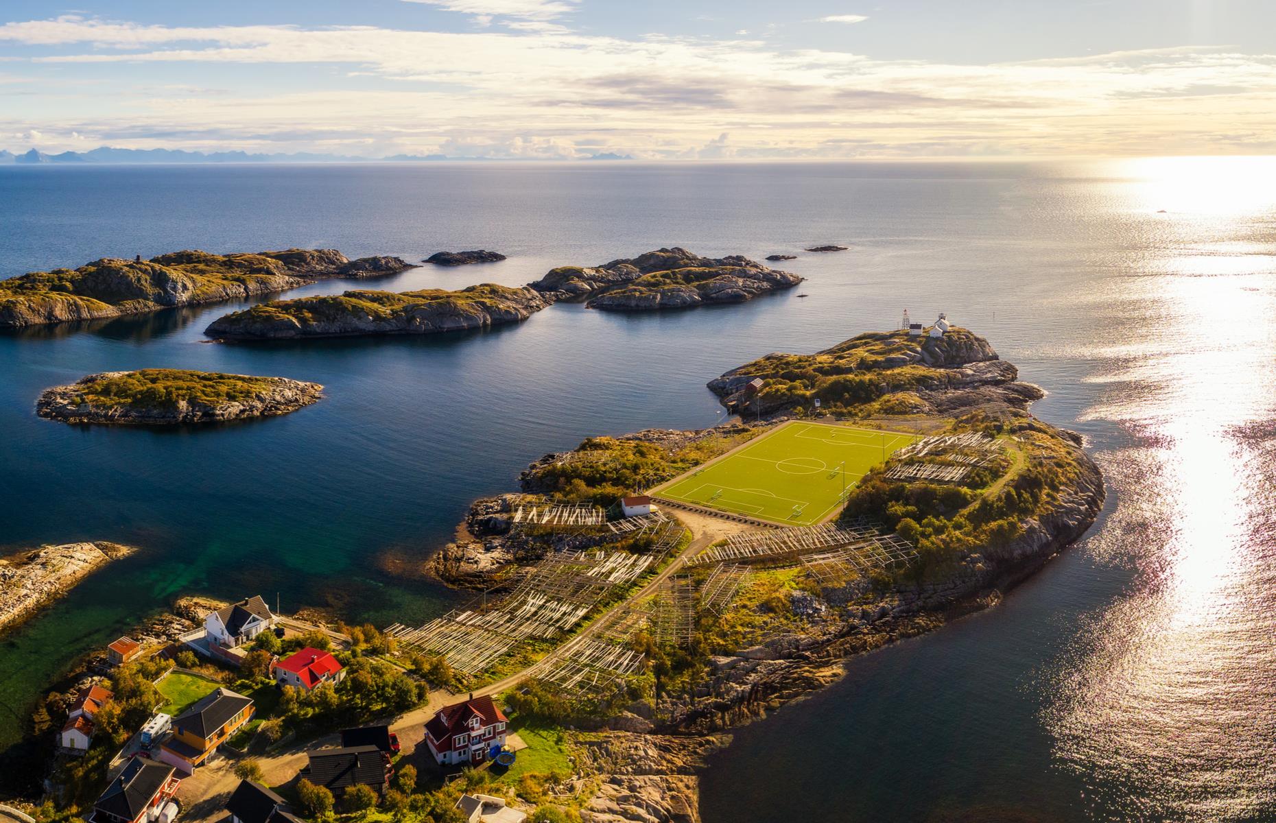 <p>Home to the second ultra-remote soccer pitch in our round-up, Henningsvær is a traditional fishing village located on the southern side of Norway’s Lofoten Islands. With its idyllic wooden houses perched atop a rocky finger of land reaching out into ice-cold seas, this far-flung village is as secluded as they come.</p>  <p><strong><a href="https://www.loveexploring.com/gallerylist/103411/the-worlds-most-beautiful-coasts">Discover the world's most stunning coastlines</a></strong></p>
