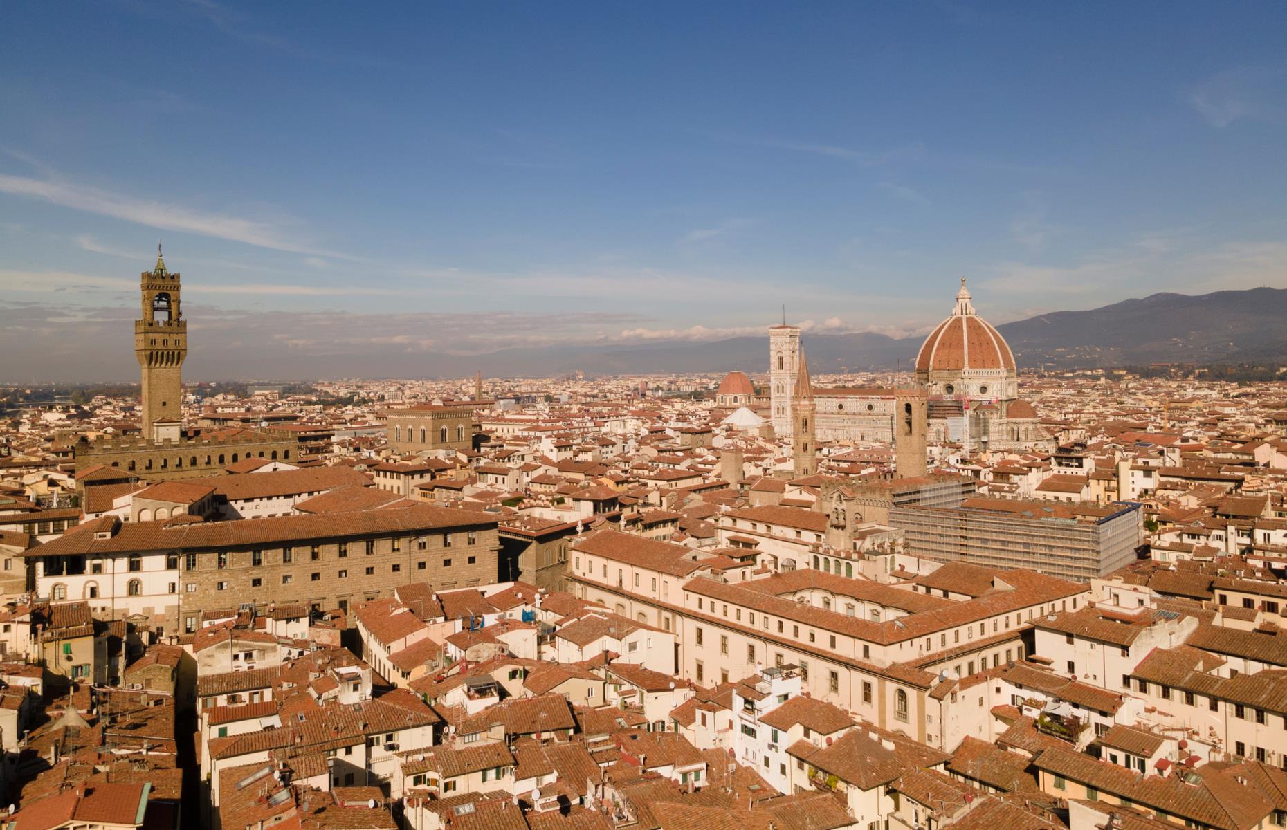 <p>Surrounded by Tuscany’s rolling hills, <a href="https://www.loveexploring.com/guides/83897/explore-florence-top-things-to-see-and-do-best-hotels-and-where-to-eat">Florence</a> is a hub for Renaissance architecture and art, set within its labyrinthine streets and dusty-hued buildings. While it may not be possible to wander these storied streets right now, we can gaze upon the likes of Brunelleschi's Dome, its iconic cathedral, the spires of the Piazza della Signoria and Palazzo Vecchio, and its patchwork of pretty terracotta rooftops. </p>