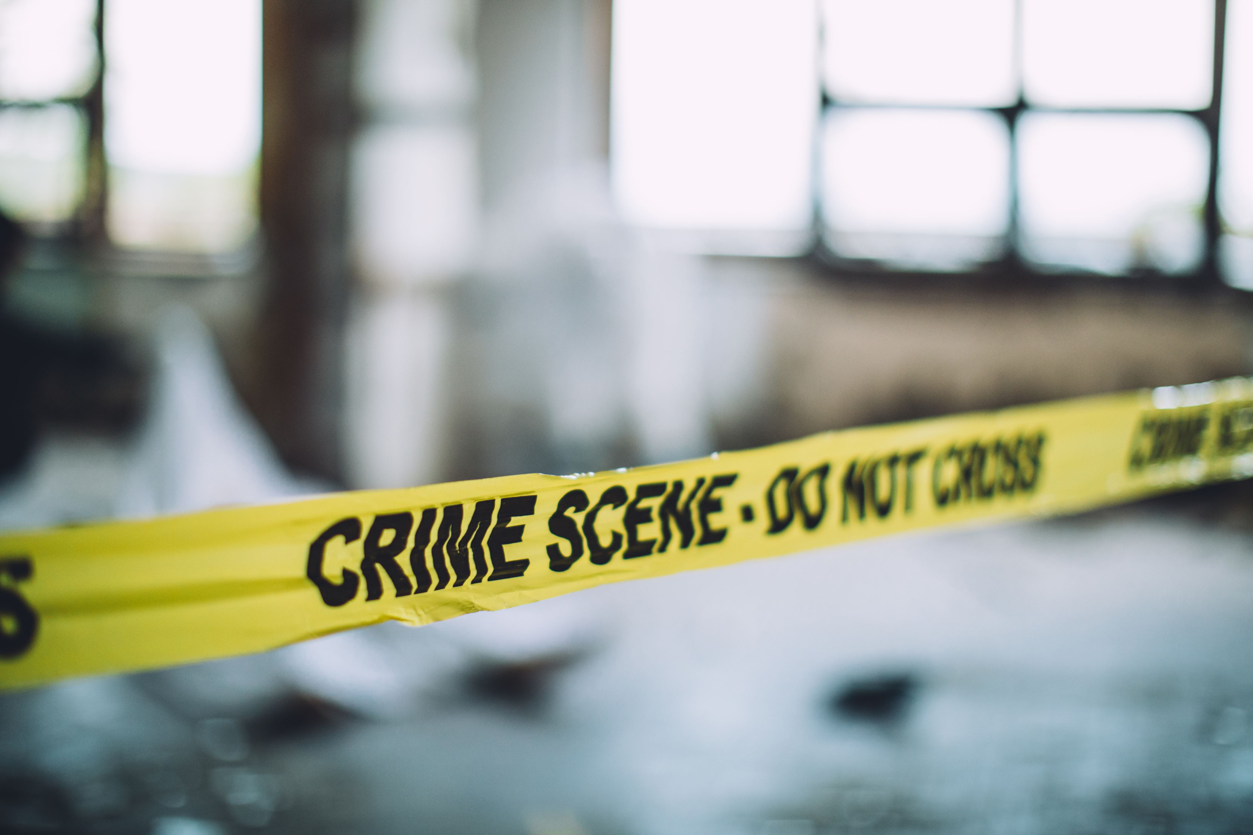 Cordon Tape On A Crime Scene - stock photo