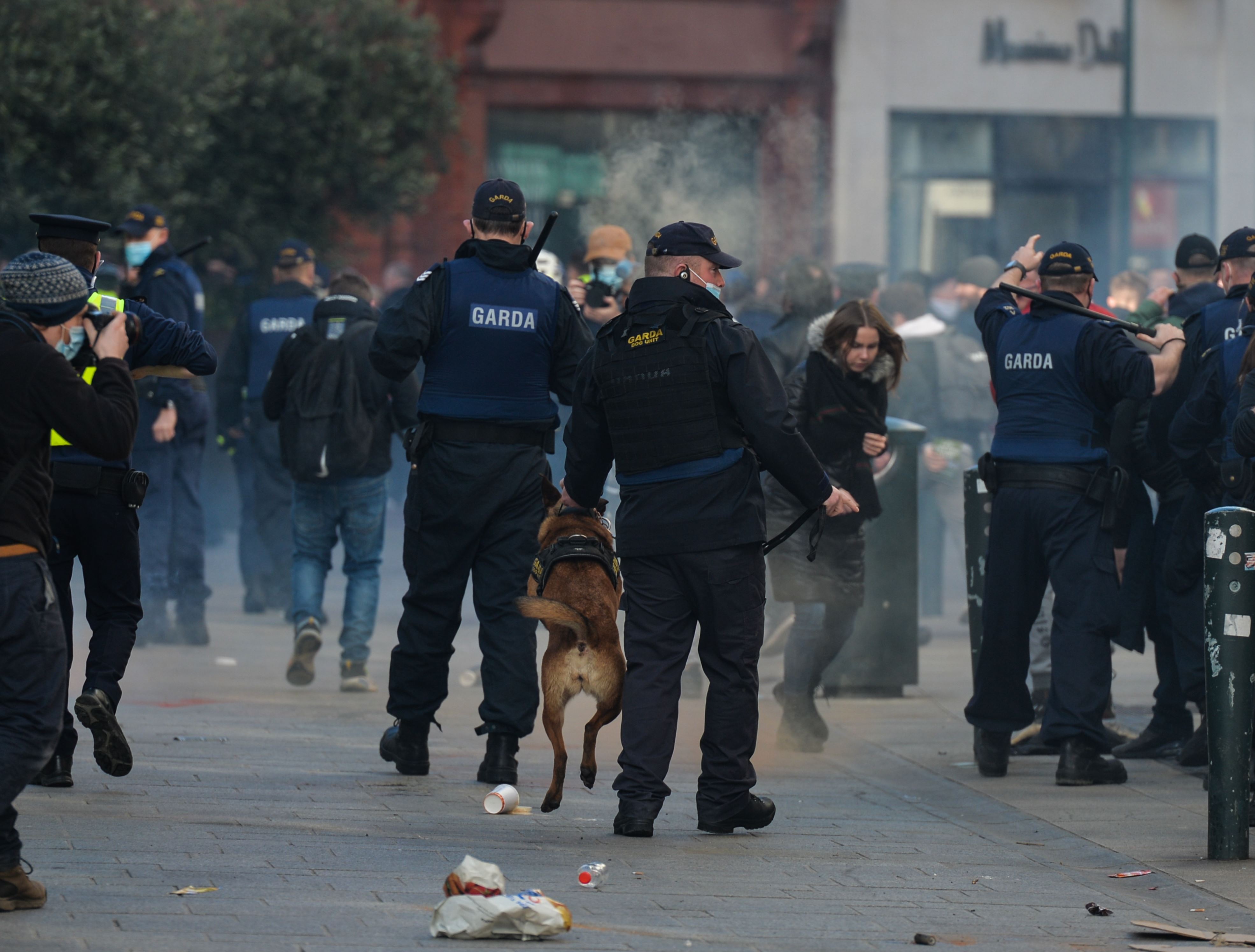 A group of Anti-Lockdown protesters clash with Gardai (Irish Police) in Grafton Street, Dublin, during Level 5 Covid-19 lockdown. On Saturday, Fabruary 27, 2021, in Dublin, Ireland.