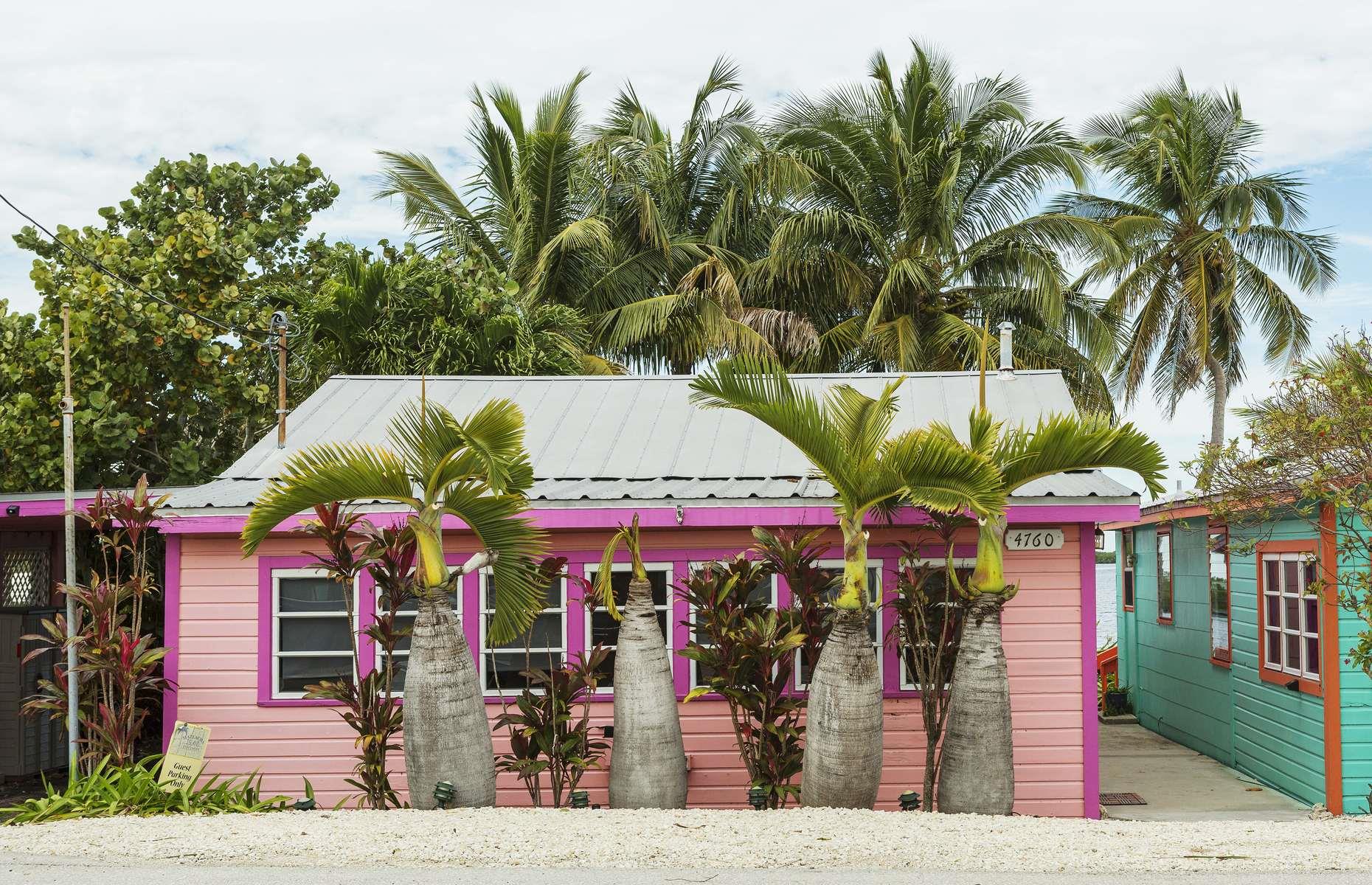<p>Colorful beachfront cabins such as this one are a common sight in Matlacha. Located on a small spit off the coast of Fort Myers, the hamlet is painted in a rainbow of unashamedly bright hues. It started life as a fishing village but in the 1990s, when it became clear that the dwindling fishing industry wasn’t enough to support all residents, locals took to the paint palette to revive the town and attract tourists. Inside these vivid buildings you’ll find art galleries, beach bars, independent restaurants and more.</p>