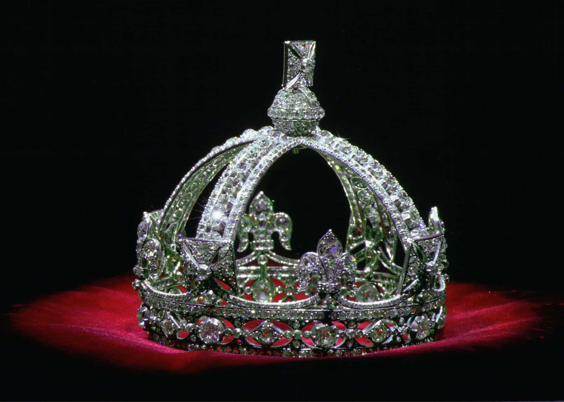 <p>Queen Victoria's small diamond crown, pictured on display in the Jewel House at the Tower Of London. It's a miniature imperial and state crown made at the monarch's request in 1870 to wear over her widow's cap following the death of her husband, Prince Albert.</p>