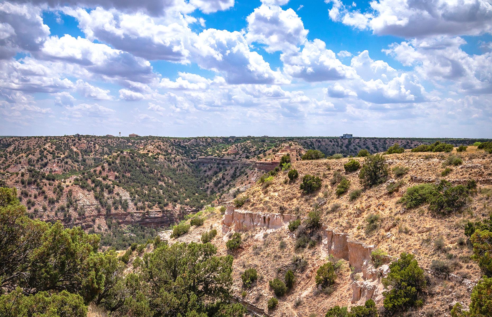 <p><a href="https://tpwd.texas.gov/state-parks/palo-duro-canyon">Palo Duro Canyon State Park</a>, located in the Texas Panhandle, is home to the second-largest canyon in the United States (trumped only by the famed Grand Canyon in Arizona). Its rugged red scarps are dotted with shrubs and when it comes to sunsets, Palo Duro rivals its better-known western counterpart. You can horse ride, bike or hike the park's miles of trails, spend the night in a rustic cabin and even see live music at the park's open-air amphitheater. </p>