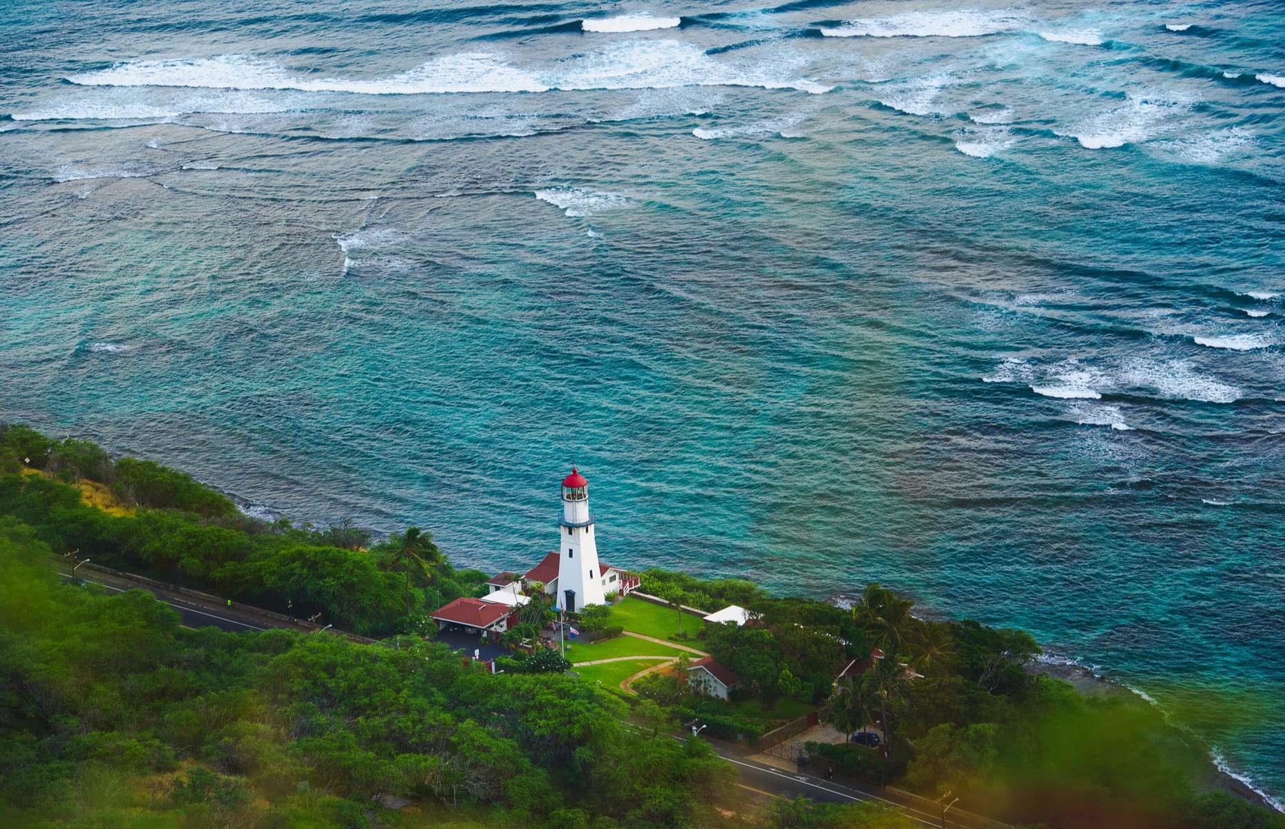 <p>Recognize this quaint little lighthouse? Diamond Head Lighthouse in Oahu, Hawaii was memorialized on a US postage stamp in 2007. Sitting on the southwestern edge of Diamond Head, a 3,520-foot (1,073m) wide crater formed by a volcanic eruption 300,000 years ago, the lighthouse has stood guard over the coast since 1899, when it was built following two shipwrecks.</p>  <p><a href="https://www.loveexploring.com/gallerylist/69708/american-islands-that-arent-in-north-america"><strong>Discover these American islands that aren't in North America</strong></a></p>