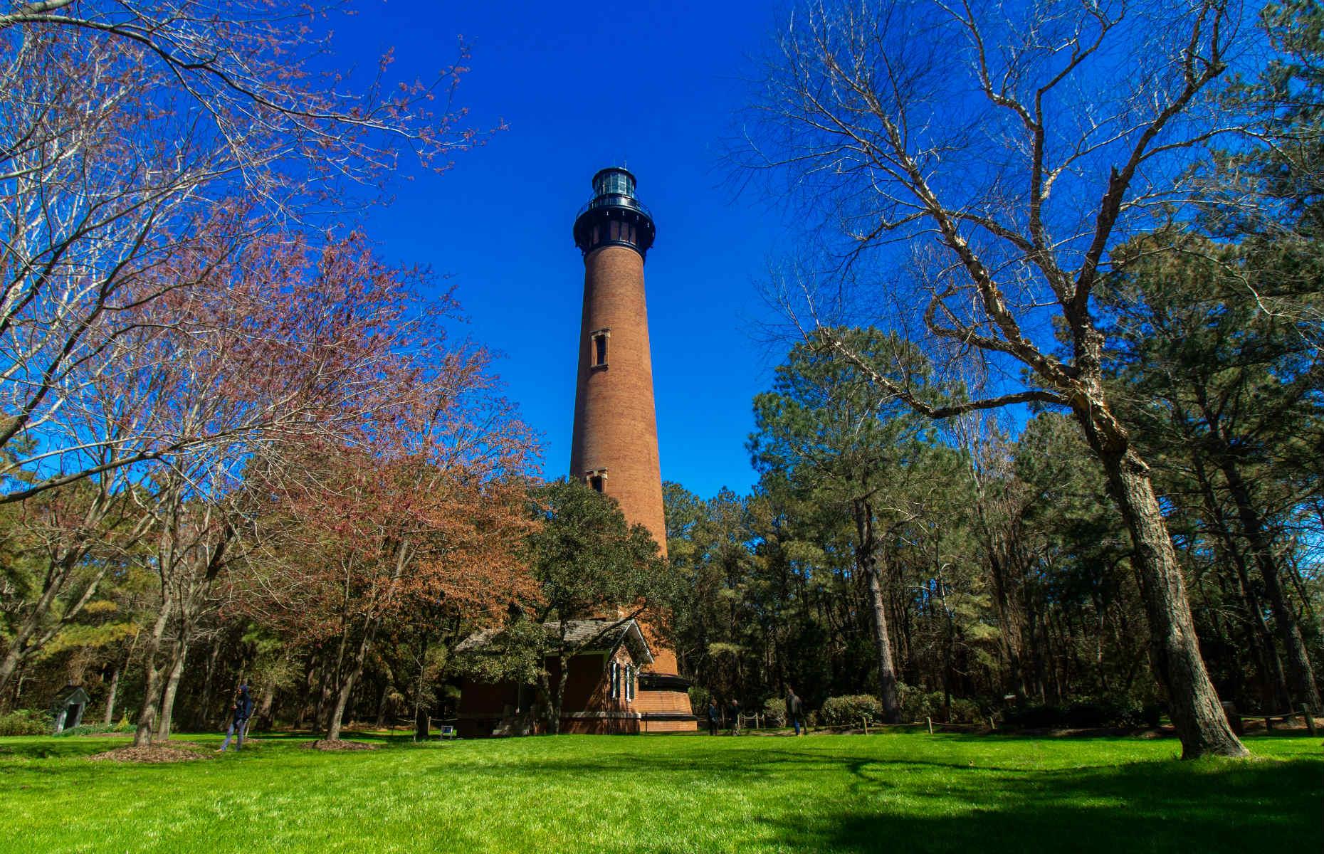 <p>First illuminated in 1875, this Gothic-inspired brick tower looks out over the northern Outer Banks in Corolla village. Inside, there’s a 214-step spiral staircase to the top, which offers dazzling views of Currituck Sound, the Atlantic Ocean and the Currituck Outer Banks. </p>