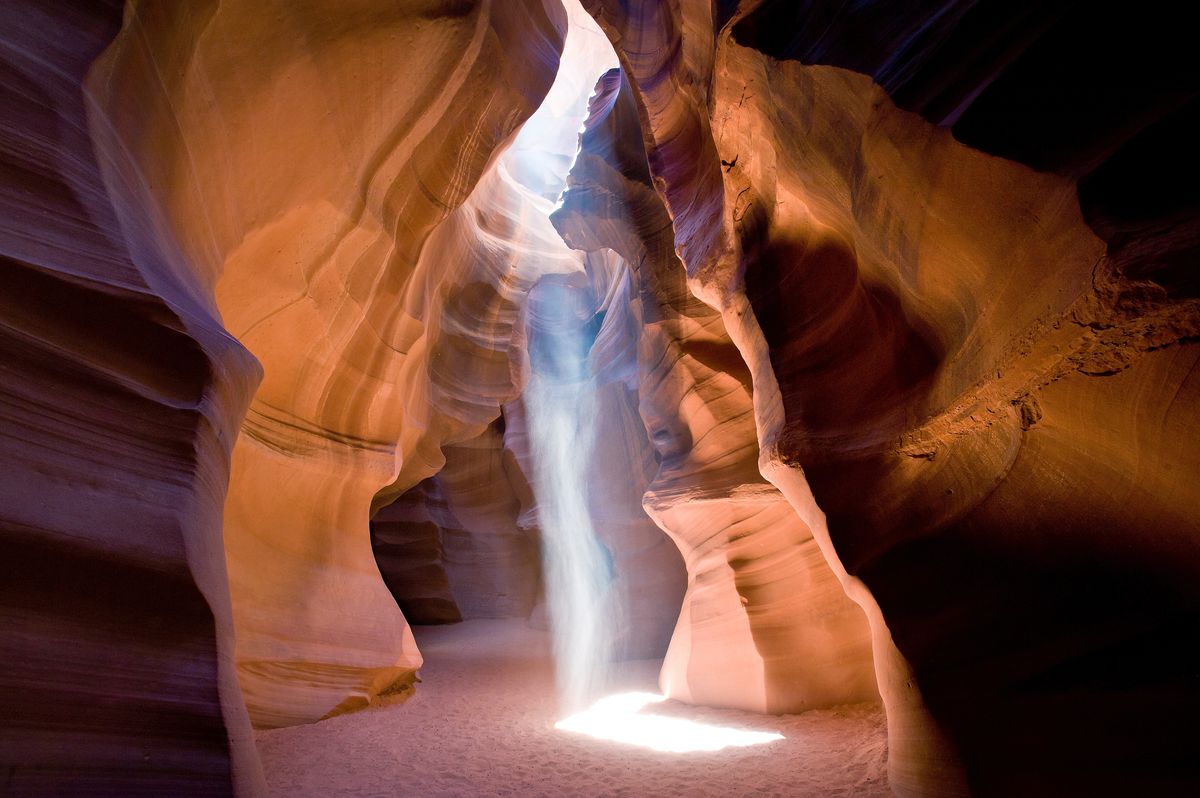 <p>The rock formations in Arizona's Antelope Canyon look absolutely surreal. Operated by the <a href="http://navajonationparks.org">Navajo Parks and Recreation Department</a>, the canyon was <a href="http://www.howitworksdaily.com/how-antelope-canyon-formed/">formed by fast-flowing flash flood waters</a>. Bring your best camera if you decide to tour the location — the sunbeams play off the canyon walls to create colors you'll want to capture.</p>