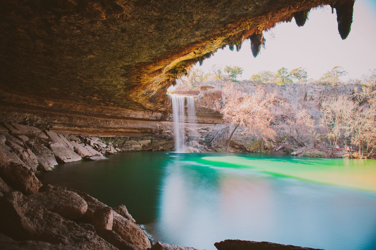 <p>Just a short drive away from Austin, Texas, you'll find the magical (and historic) <a href="https://parks.traviscountytx.gov/find-a-park/hamilton-pool">Hamilton Pool Preserve</a>. Hamilton Creek spills out over a limestone overhang to create a 50-foot waterfall and underlying pool, which is a popular swimming spot. It's so popular, in fact, that Travis County Parks has started taking <a href="https://parks.traviscountytx.gov/reservations/hamilton-pool">visitor reservations</a> for it. </p>