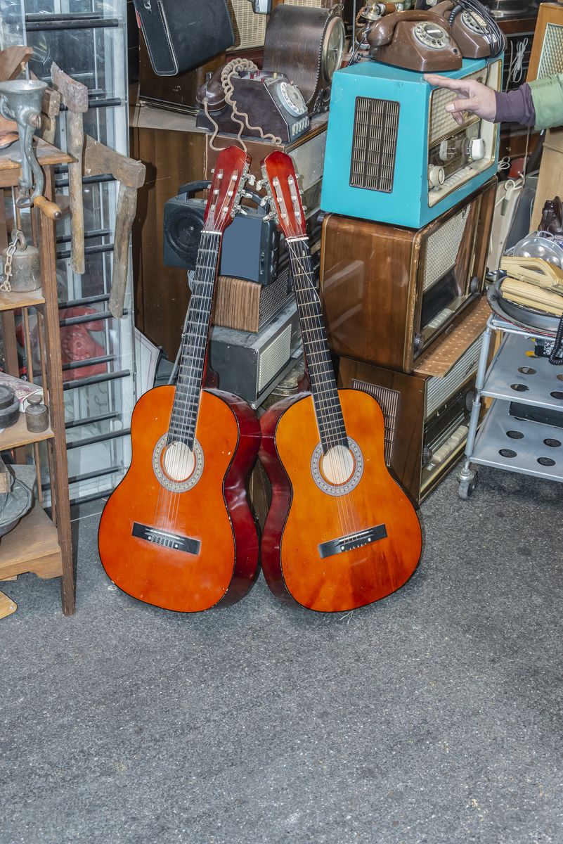 <p>Whether or not you can play a lick, buying that old axe sitting in the corner of the garage sale can bring big returns. Used guitars from esteemed brands including Martin, Taylor, and Gibson can sell for thousands on sites like <a href="https://reverb.com/price-guide/acoustic-guitars">Reverb</a>.</p>