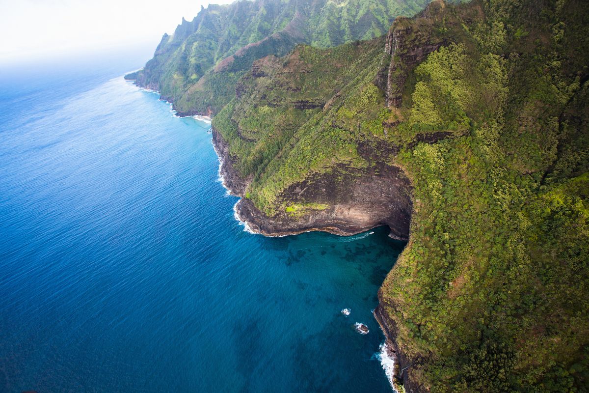 <p>Along the island of <a href="http://www.napaliriders.com/sea-caves-kauai-na-pali-coast/">Kauai's Na Pali Coast</a>, you will find a number of gaping sea caves. Formed by harsh waves slamming into the island's porous lava rock, the caves now provide the perfect place for kayakers and other adventure-seekers to get up close and personal with the land.</p>