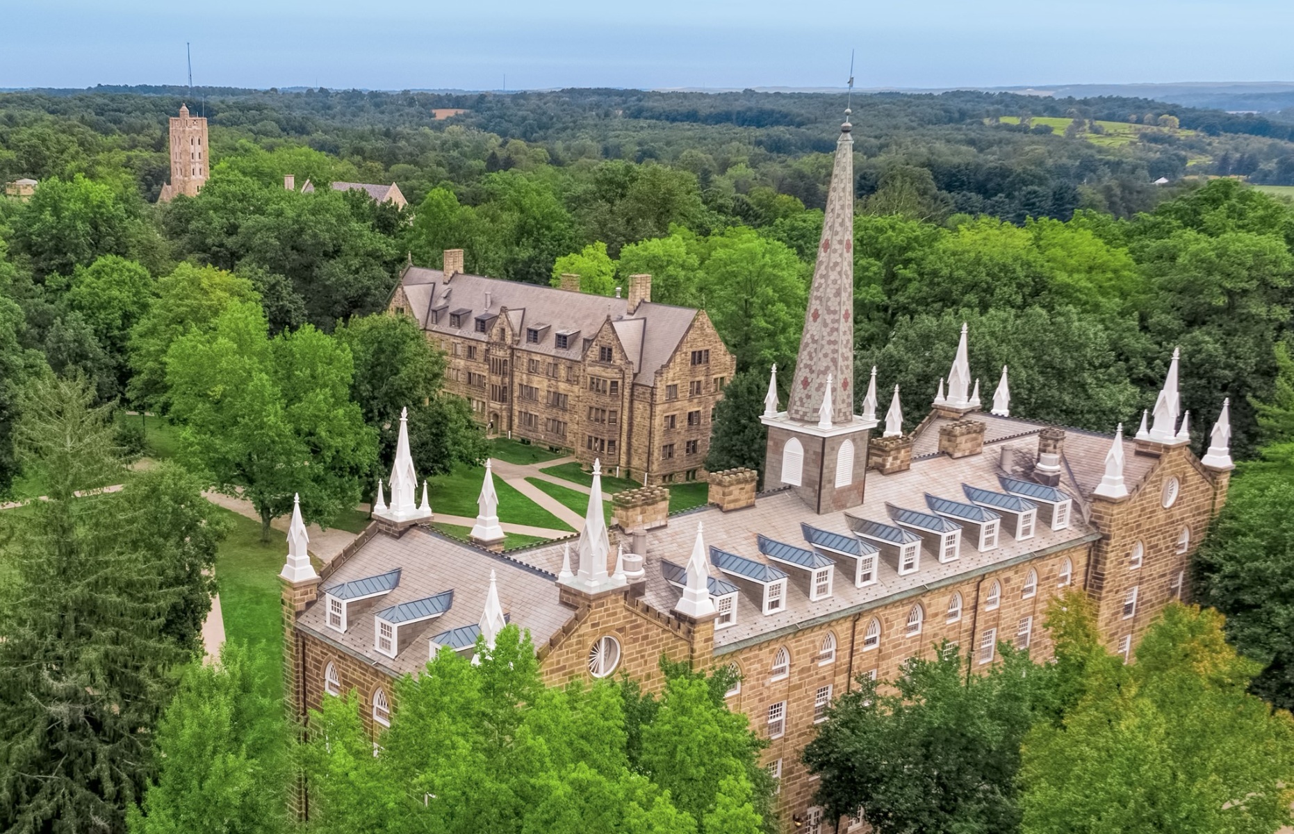 <p><a href="http://www.kenyon.edu/" rel="noreferrer noopener">Kenyon College</a> is located on a hilltop in the village of Gambier, Ohio, where students can take advantage of beautiful hiking trails and attend classes in magnificent Gothic buildings.</p>