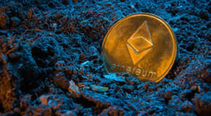 a close up of a sign: A concept image of mining an Ethereum (ETH) token.