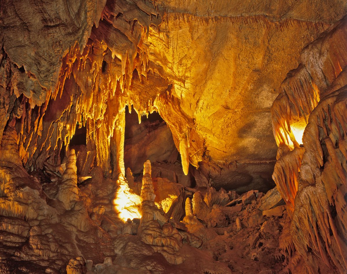 <p>Underneath the rolling hills of Central Kentucky lies <a href="https://www.nps.gov/maca/index.htm">Mammoth Cave</a> — the world's longest known cave system — where more than 400 miles of it have been explored. Visitors can tour the cave, then choose from nearby activities including horseback riding, biking, and camping. </p>