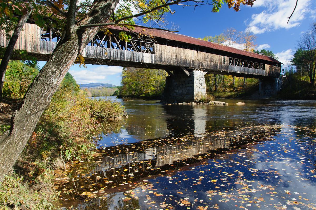 <p>At 292 feet long, New Hampshire's rustic <a href="http://www.nhtourguide.com/covered_bridges/blair_bridge_campton_nh.htm">Blair Covered Bridge</a> is the second longest in the state. The original bridge, which was built in 1829, burned down before the current bridge was constructed in 1869. Although it's been weathered and worn by travelers and hurricanes, the state of New Hampshire and the town of Campton continue to put in the effort to <a href="http://www.wmur.com/escape-outside/historic-blair-bridge-now-open-after-restoration/26860766">restore this historic site</a>.</p>