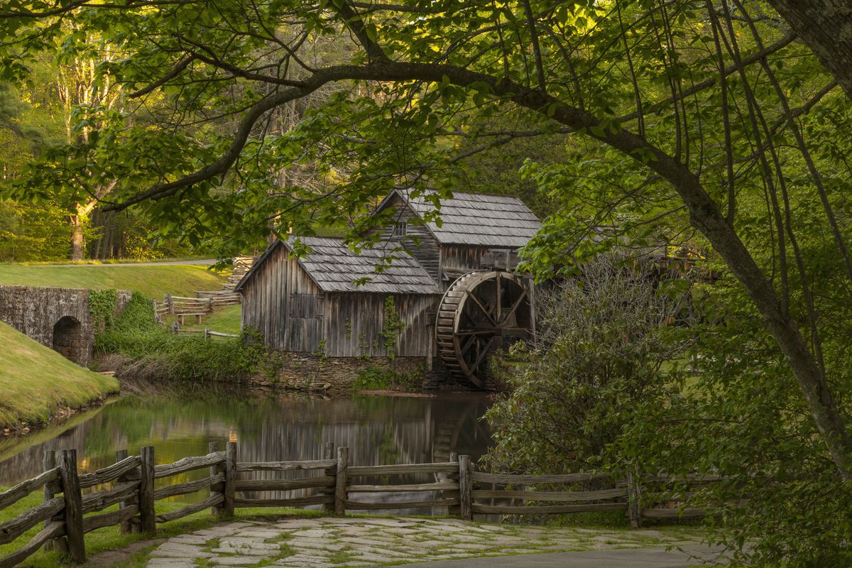 <p>Located off the scenic Blue Ridge Parkway at milepost 176.1, <a href="http://www.virtualblueridge.com/parkway-place/mabry-mill/">Mabry Mill</a> stands rustic and proud — and rightfully so, as the location is perhaps one of the most-photographed in America. The historic mill, built by Edwin Boston Mabry in the 1800s, has been restored so visitors can enjoy live exhibits and demonstrations of the milling process. During summer Sunday afternoons, the mill also comes alive with musicians and dancers.</p>