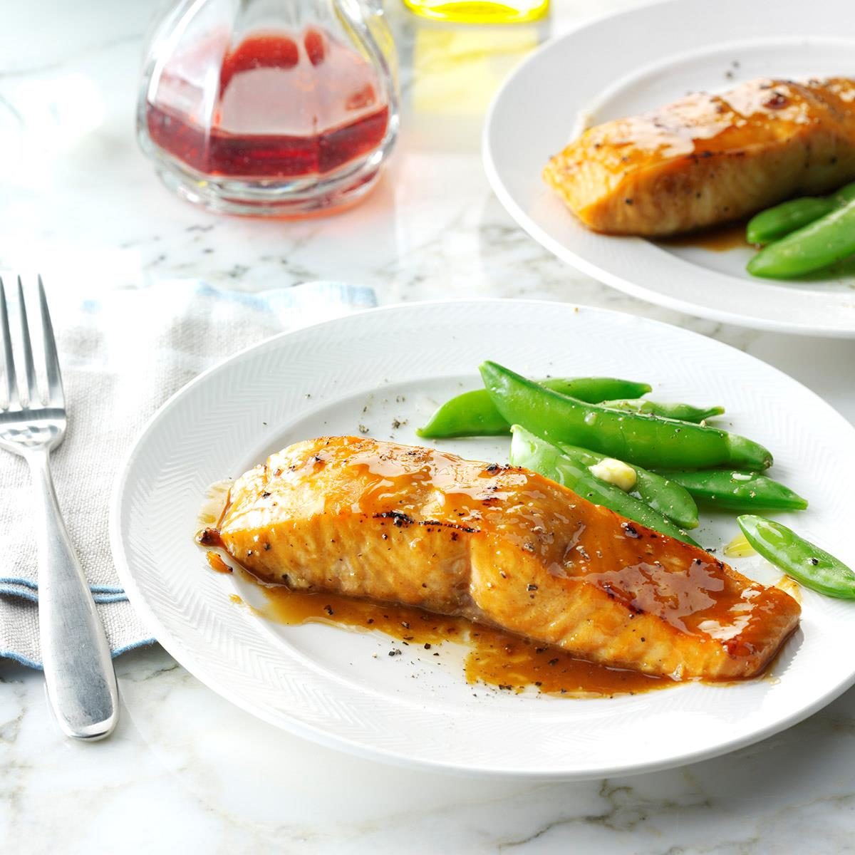 <p>Pop these protein-packed salmon fillets in the oven before whipping up a sweet basting sauce. This tangy entree cooks up in minutes making it a perfect meal for busy families and unexpected weekend guests. —Debra Martin, Belleville, Michigan</p> <div class="listicle-page__buttons"> <div class="listicle-page__cta-button"><a href='https://www.tasteofhome.com/recipes/brown-sugar-glazed-salmon/'>Get Recipe</a></div> </div>