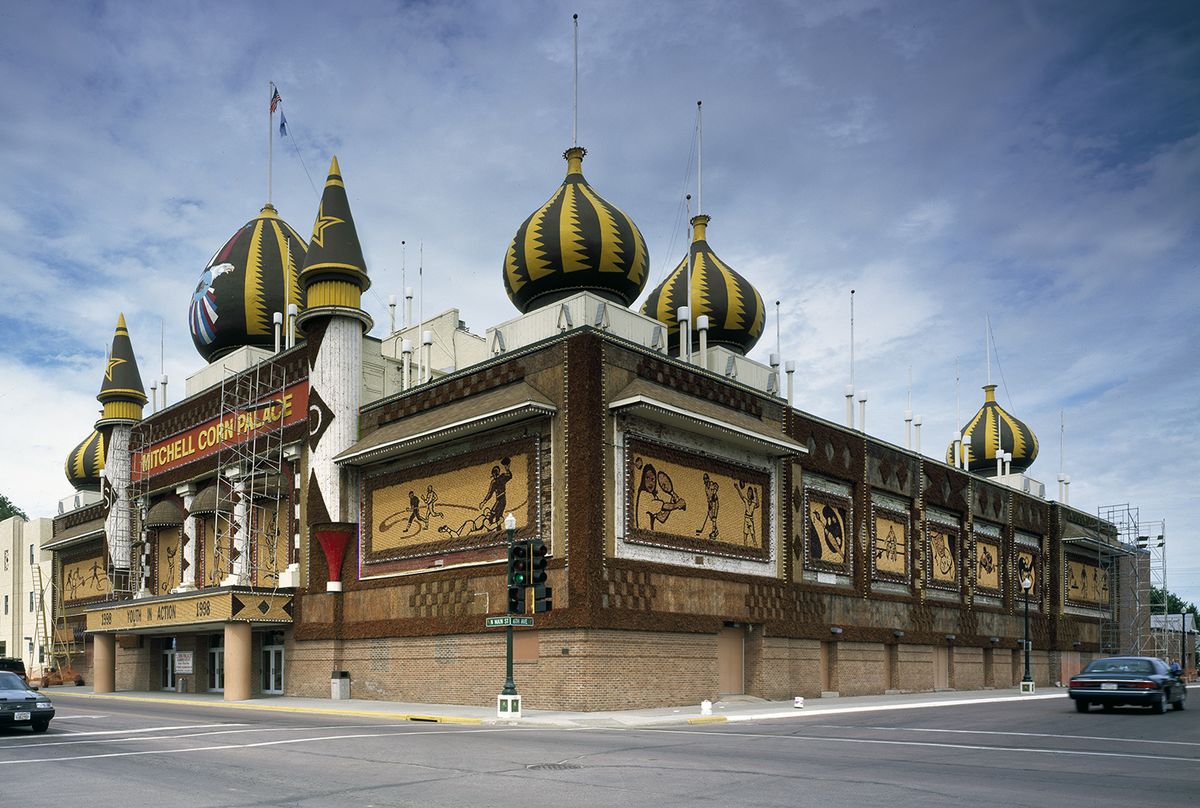 <p>The exterior walls of the <a href="http://www.cornpalace.org">Corn Palace</a> in Mitchell, South Dakota are <em>actually</em> made out of corn, and the design changes every year. </p>