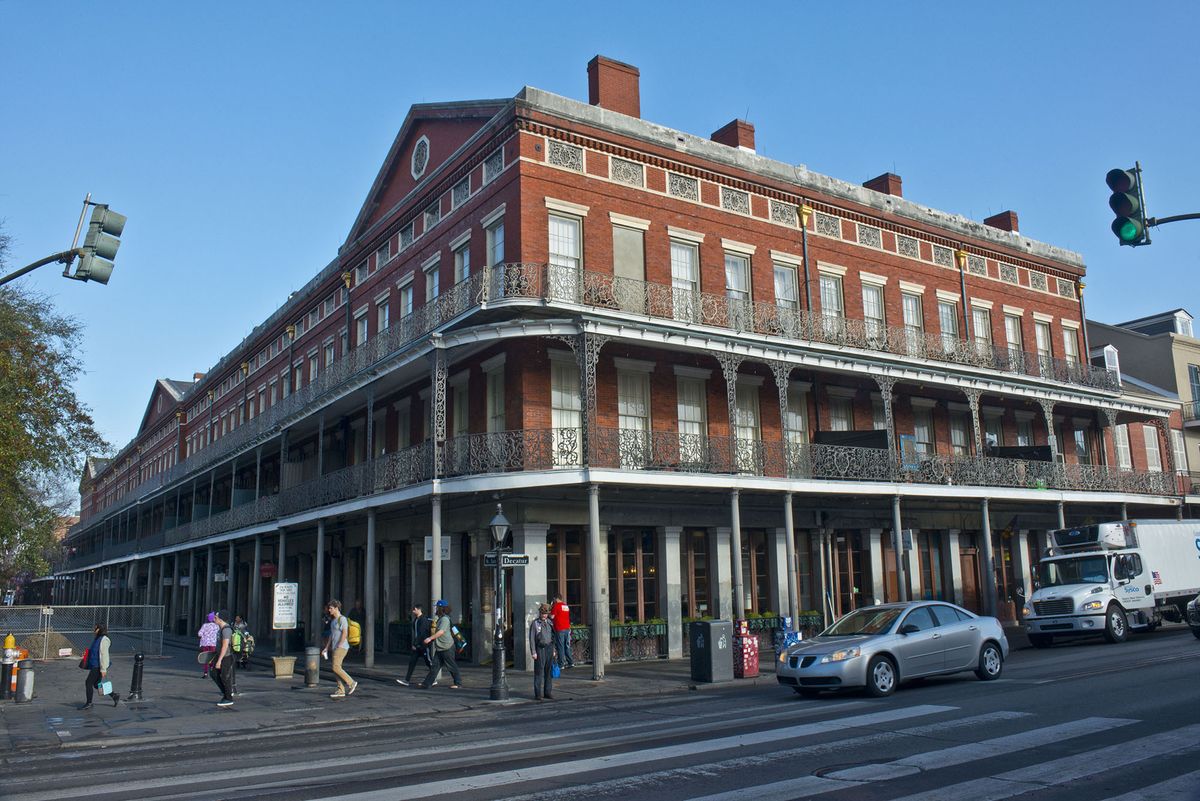 <p>When you think of New Orleans' famous French Quarter, you probably conjure up images of buildings that look something along the lines of the exquisite <a href="http://www.frenchquarter.com/pontalbabuildings/">Pontalba Buildings</a>. Completed in 1851, the two row houses on Jackson Square are a mix of French, American, Creole, and Greek Revival styles.</p>