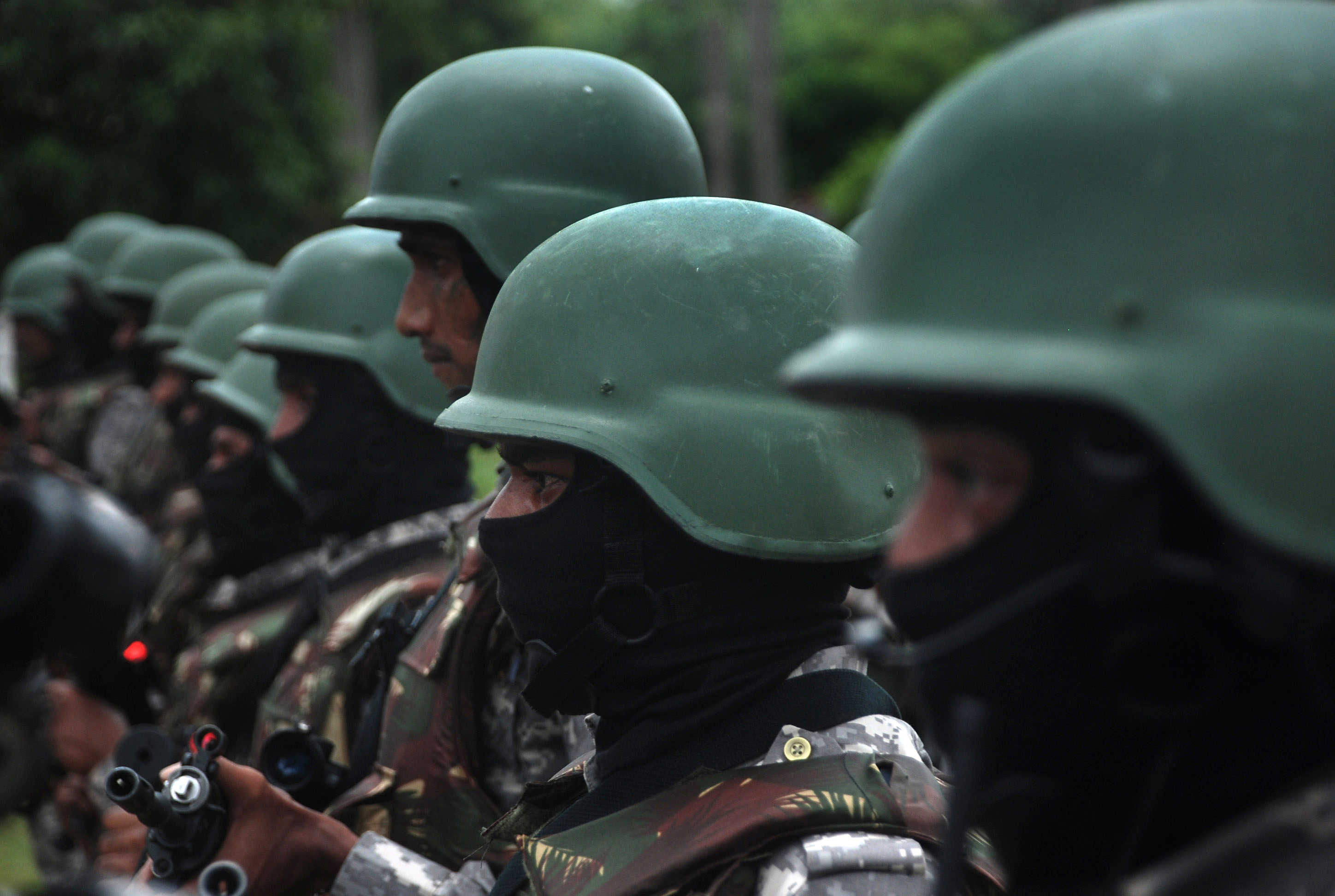 Indian members of a special tactical unit, including personel of the Special Operation Group (SOG) skilled for anti-naxal operation, display their skills during a demonstration in Bhubaneswar on July 8, 2013. The special tactical unit force has been created to combat terrorist activities in urban areas. AFP PHOTO/ ASIT KUMAR (Photo credit should read ASIT KUMAR/AFP/Getty Images): Representational image