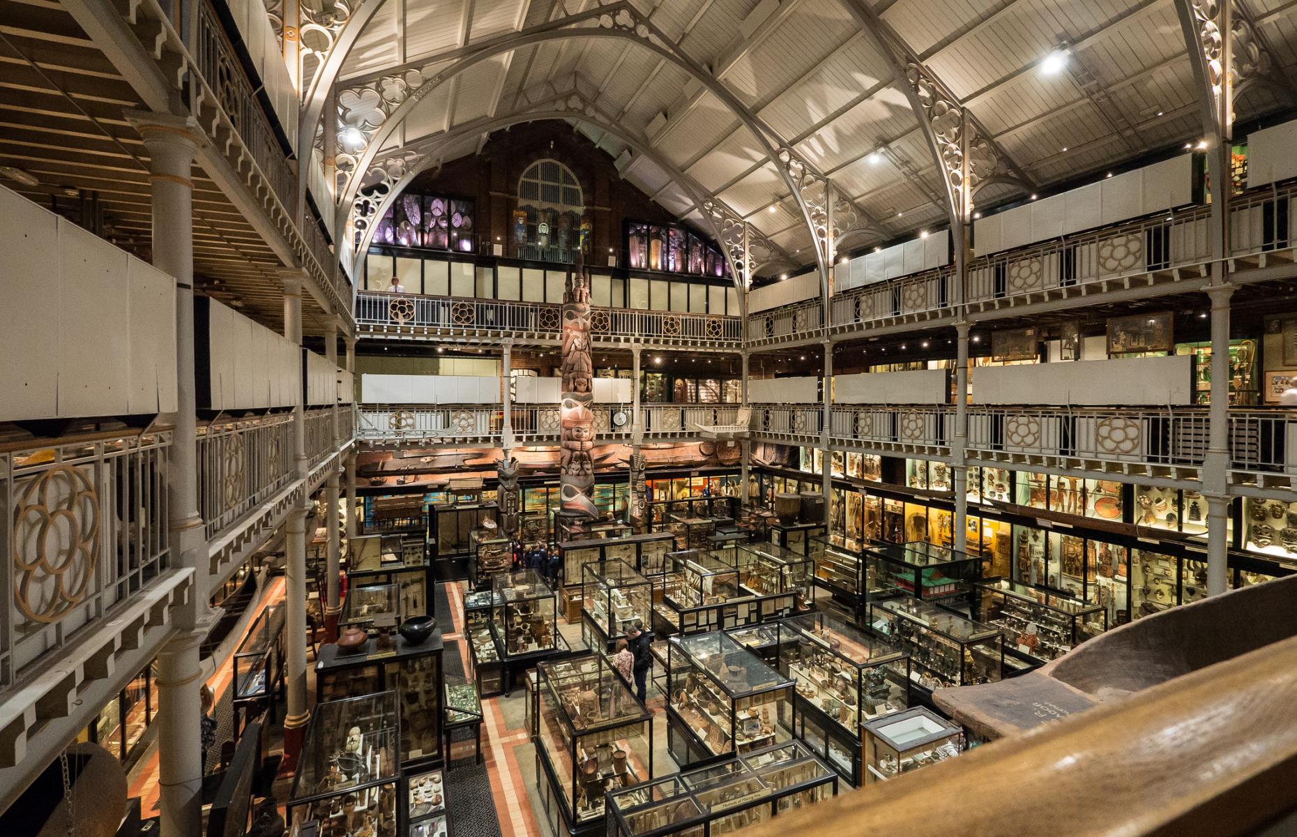 <p>At the rear of the Oxford University Museum of Natural History, the Pitt Rivers Museum in <a href="https://www.loveexploring.com/news/72568/the-top-things-to-do-in-oxford-attractions">Oxford</a> is home to over half a million archaeological and ethnographic objects. Founded in 1884, it was named after General Pitt-Rivers who donated his collection to the university. Today, the collection of items are from all over the world, ranging from ancient amulets and charms to an impressive amount of 19th and early 20th century photographs.</p>