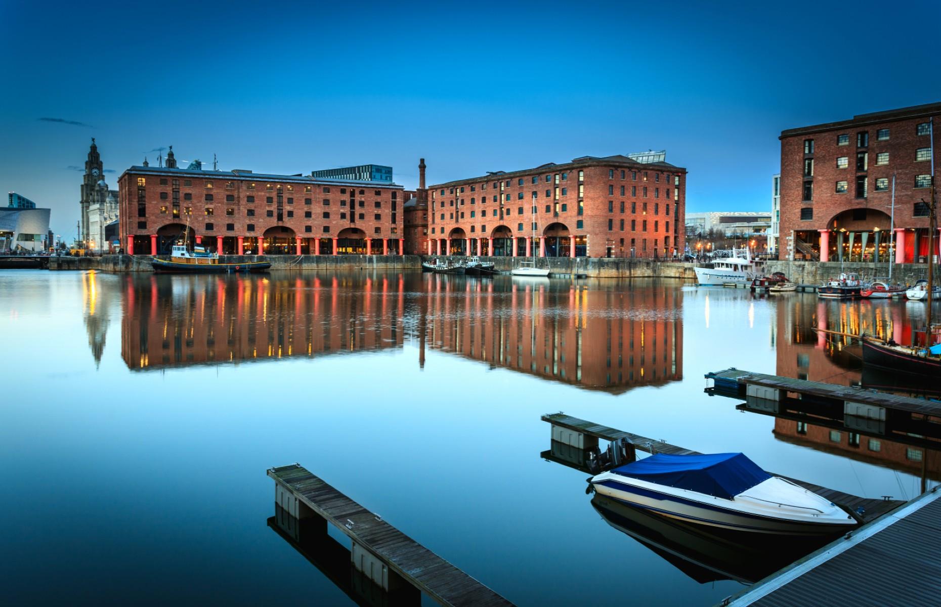 <p>Situated within <a href="https://www.loveexploring.com/news/72367/a-dynamic-northern-city-what-to-do-in-liverpool">Liverpool</a>’s world-renowned waterfront, the breathtakingly beautiful Albert Dock is home to the largest collection of Grade I-listed buildings in the UK. Established in 1846, the port became one of the world’s largest trading centres and played an important role in the transatlantic slave trade during the 18th century. Following its closure in 1972, the dock’s old warehouses have become a vibrant cultural attraction, featuring the Tate Liverpool, The Merseyside Maritime Museum and the International Slavery Museum.</p>