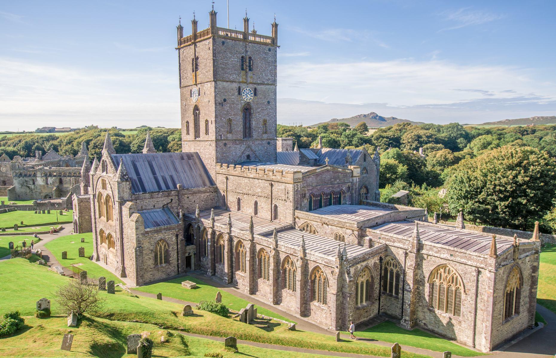 <p>Rising above the tiny city of <a href="https://www.loveexploring.com/news/72215/st-davids-wales-what-to-see-do-in-britains-smallest-city">St Davids</a>, this glorious cathedral in Pembrokeshire is thought to be one of the greatest religious sites in Wales. A place steeped in history, the present 12th-century structure stands where St Davids founded a monastery around AD 600. With its gorgeous architecture, historic artwork and magnificent chapel, St Davids Cathedral is a real highlight of Britain’s smallest city. </p>