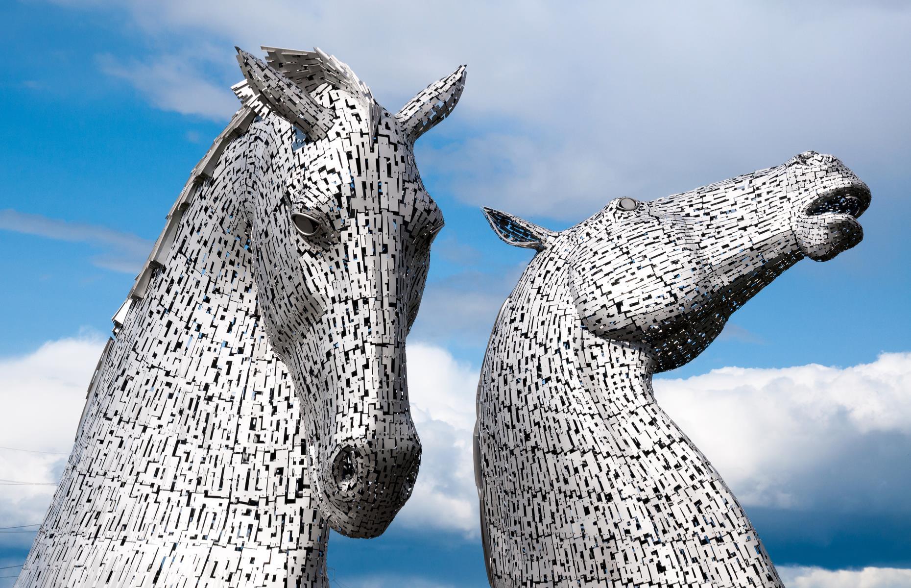 <p>These breathtaking 100-foot-high (30m) stainless steel equine statues in Scotland are the largest equine sculptures in the world. Created by artist Andy Scott, the Kelpies were modelled on two real-life Clydesdale horses, named Duke and Baron. The sculptures sit within The Helix, a green space created in 2003 to connect the communities in Falkirk. Considered an incredible feat of engineering, the Kelpies have become one of the most famous outdoor installations in the UK.</p>  <p><strong><a href="https://www.loveexploring.com/galleries/82867/the-worlds-most-jaw-dropping-sculptures-and-statues?page=1">Check out the world’s most jaw-dropping sculptures and statues</a></strong></p>