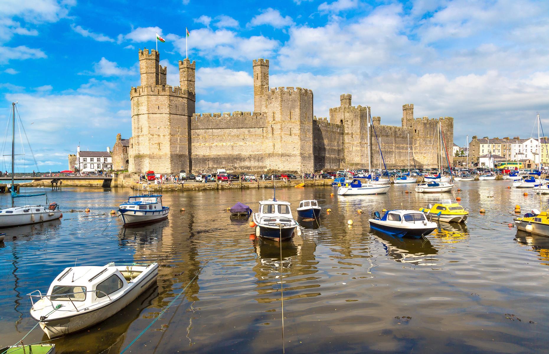 <p>Dating back to the 13th century, this impressive fortress in the royal town of <a href="https://www.loveexploring.com/news/88159/things-to-see-and-do-in-caernarfon-castle-wales">Caernarfon</a> is often hailed as one the most beautiful castles in Wales. Built by Edward I on the Menai Strait, it took a staggering 47 years to complete the castle alongside three other fortresses, Conwy, Beaumaris and Harlech as well as town walls and a quay. Considered the finest surviving examples of 13th-century military architecture in Europe, the castles and walls of Edward I were awarded World Heritage status in 1986.</p>  <p><strong><a href="https://www.loveexploring.com/galleries/64254/30-reasons-to-love-wales?page=1">Discover 30 reasons to love Wales</a></strong></p>