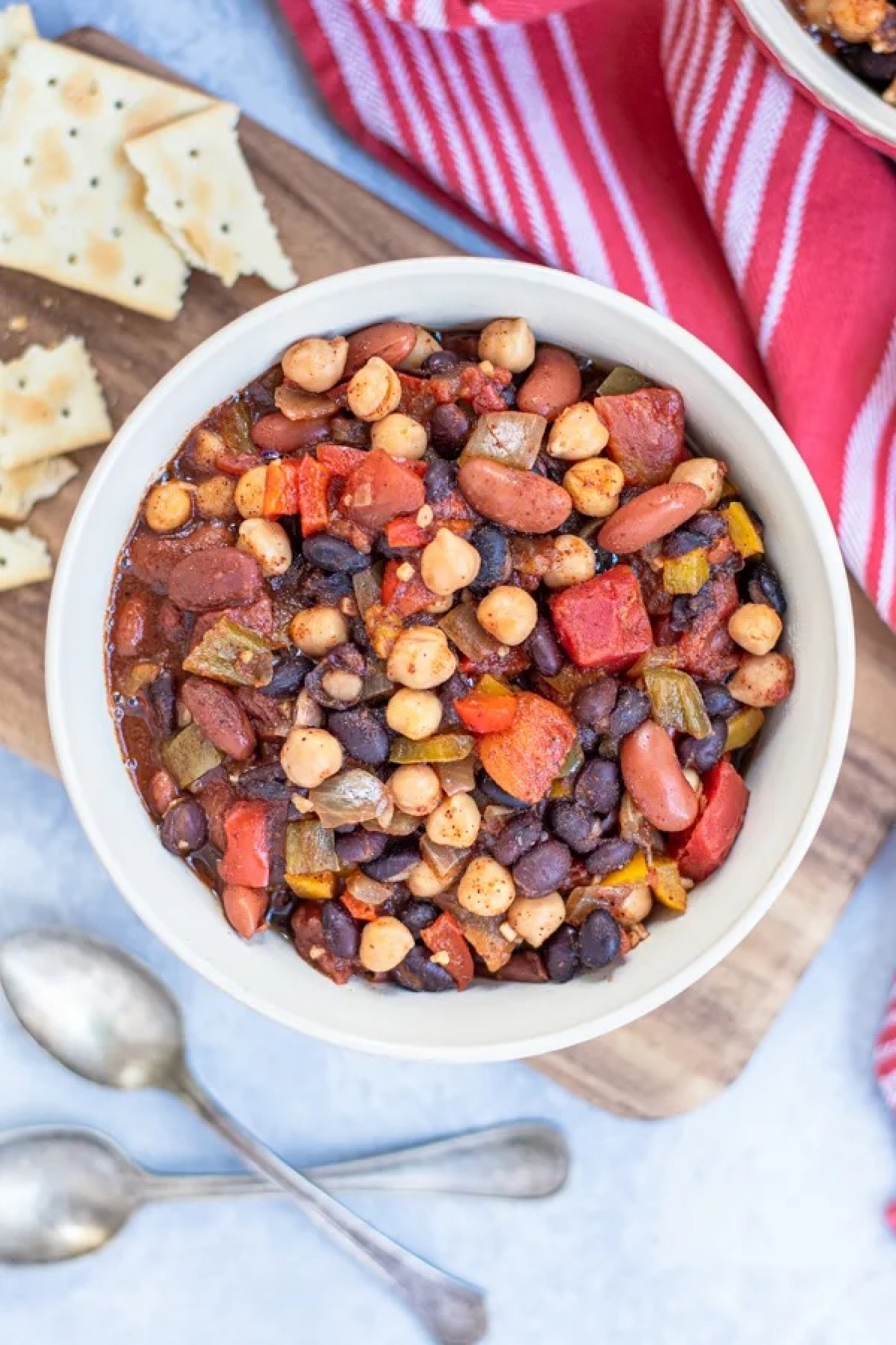<p>What would a list of bean dishes be without chili? The best part is that you can easily omit the meat and go all in on the legumes like in <a href="https://theschmidtywife.com/slow-cooker-vegetarian-chili-recipe/" rel="noopener">this slow cooker recipe</a> that keeps things low-maintenance yet tasty with a combination of chickpeas, kidney beans and black beans.</p>