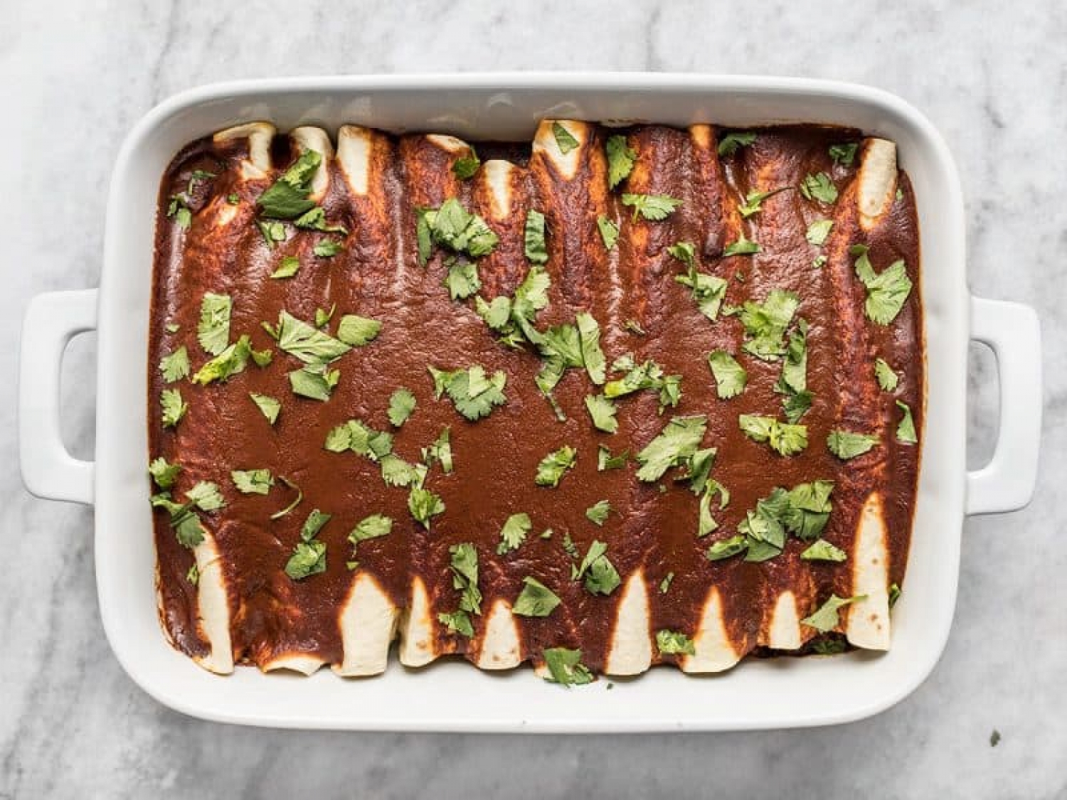 <p>These black bean and avocado enchiladas are made with the most irresistible homemade sauce and will keep you full for hours. The filling also includes corn for extra crunch and fresh cilantro to add that unmistakable Mexican flavor profile. <a href="https://www.budgetbytes.com/black-bean-avocado-enchiladas/" rel="noopener">Get the recipe here.</a></p>