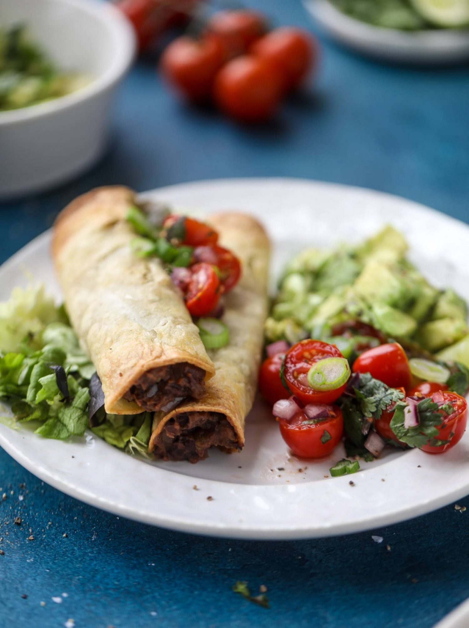 <p>Forget the frozen taquitos, and make <a href="https://www.howsweeteats.com/2019/02/taquitos/" rel="noopener">this smoky, flavorful recipe</a> with canned black beans, a bevy of spices and a refreshing avocado pico on the side. They're so good they don't even need cheese (although no one will judge if you add some).</p>