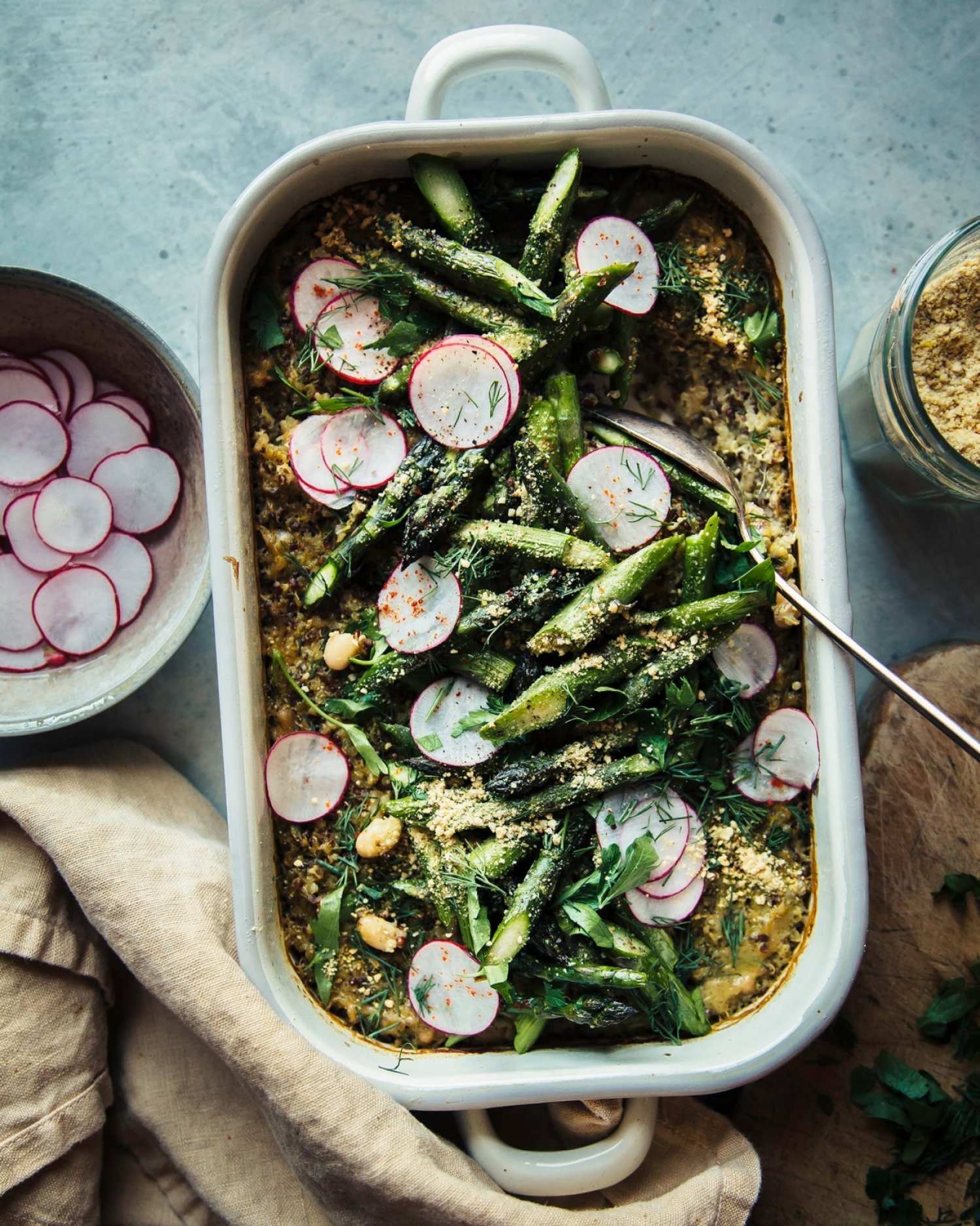 <p>White beans and quinoa provide all the belly-filling plant protein you need in this vibrant vegan-friendly bake with pesto and a host of spring veggies. Topped with fresh radishes for a piquant finishing touch, it makes for a great potluck dish or healthy weeknight dinner. <a href="https://thefirstmess.com/2020/05/13/pesto-quinoa-white-bean-bake-vegan-recipe/" rel="noopener">Get the recipe here.</a></p>