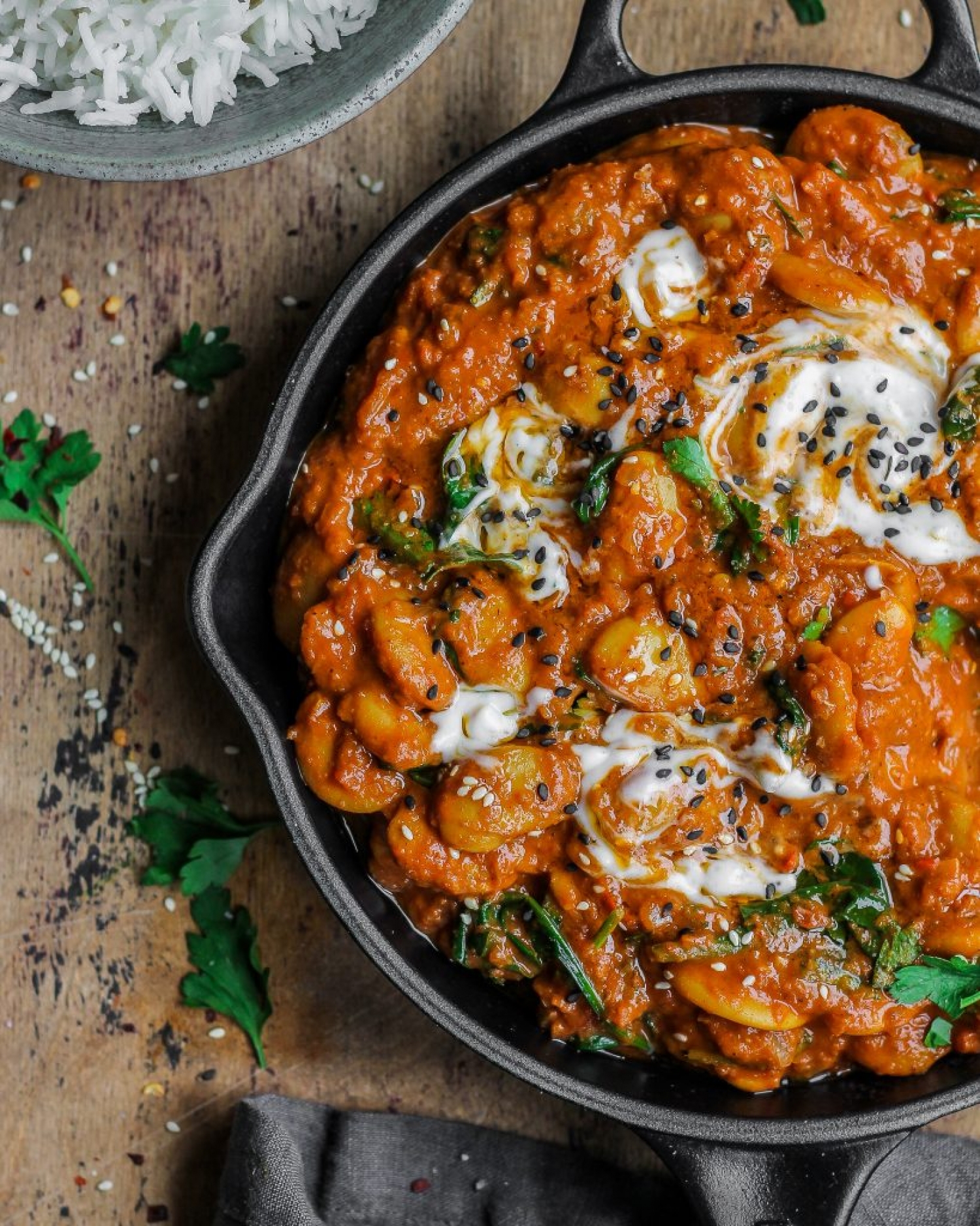 <p>This aromatic butter bean curry is brimming with good-for-you spices and wilted spinach. It includes a made-from-scratch curry paste that's a total cinch to make in the food processor, and it's one of those dishes that tastes even better the next day. <a href="https://www.happyskinkitchen.com/2019/11/20/butter-bean-coconut-curry/" rel="noopener">Get the recipe here.</a></p>