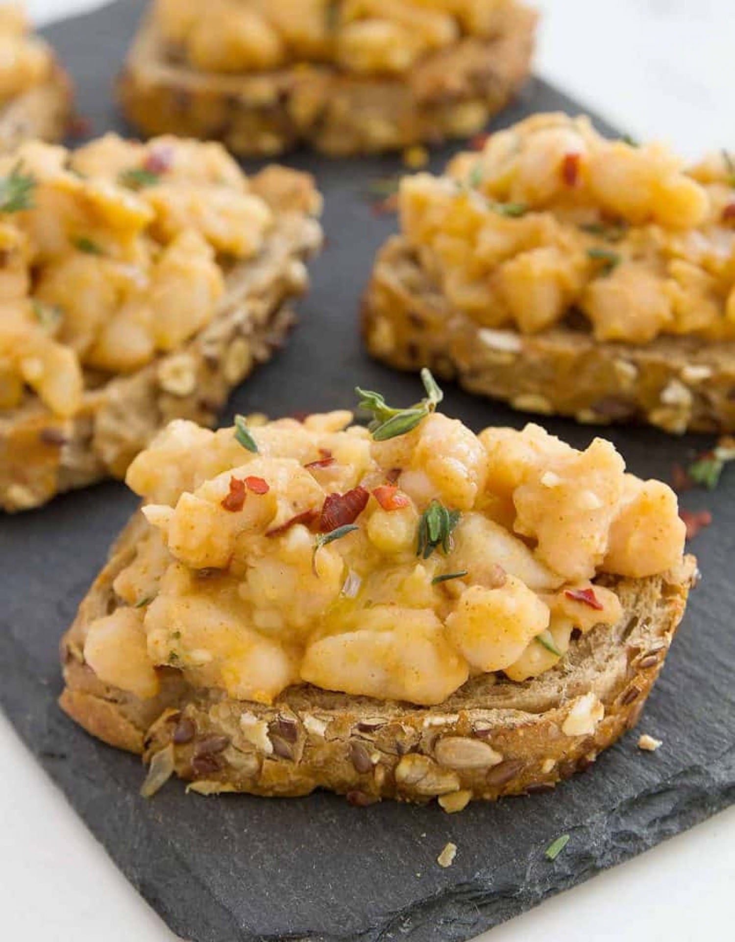 <p>These healthy and sophisticated beans on toast are an excellent alternative to tomato bruschetta when you want to serve something slightly more filling. The beans are seasoned with smoked paprika and chili flakes for a little heat and get lightly mashed for a perfectly chunky yet softened texture. <a href="https://theclevermeal.com/smoky-beans-on-toast/" rel="noopener">Get the recipe here.</a></p>