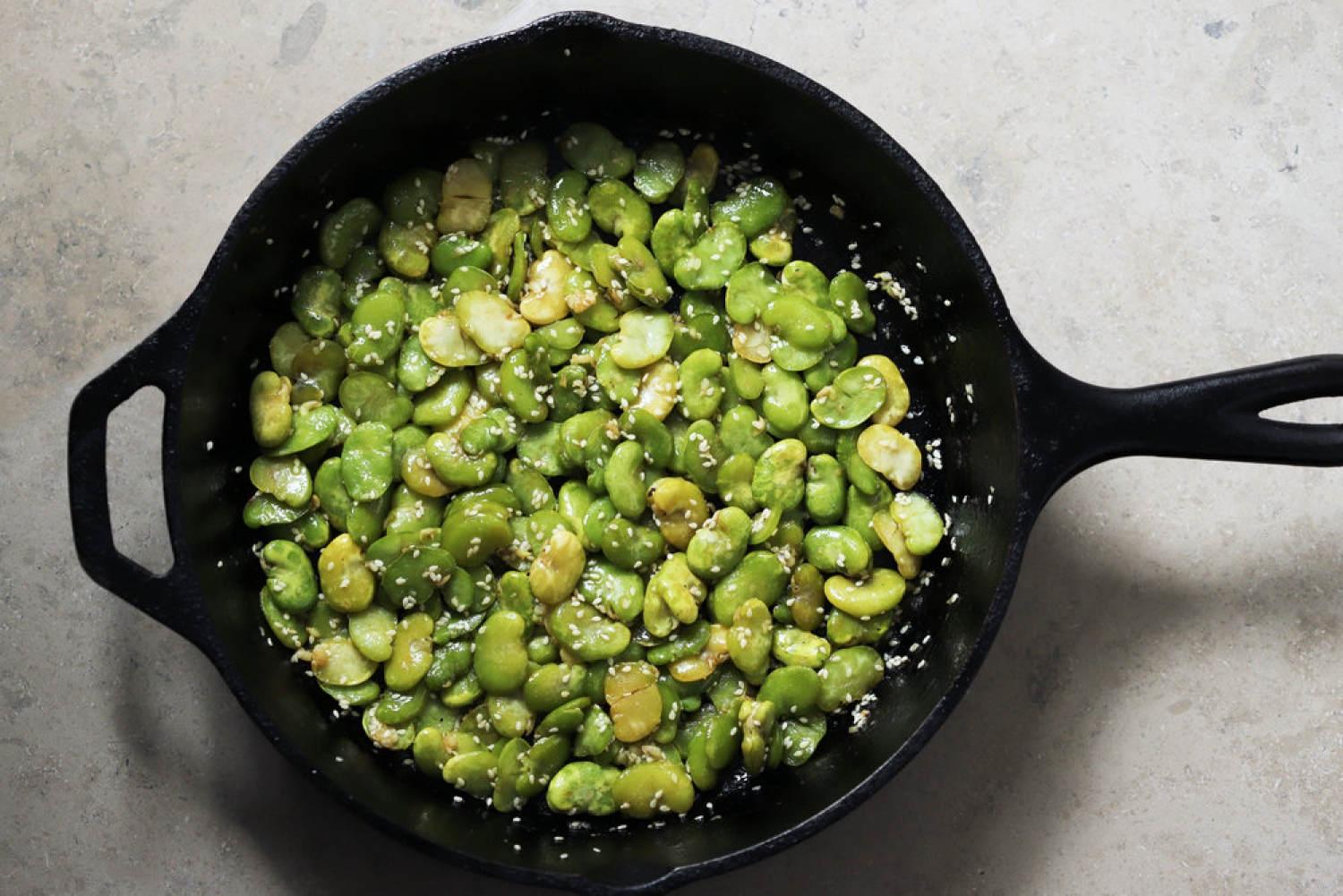 <p>Fava beans, also known as broad beans bring a bright source of protein to your plate and a slightly buttery flavor with a touch of bitterness. They are best prepared simply, as in <a href="https://www.cardamomandtea.com/blog/buttery-sesame-fava-beans" rel="noopener">this recipe</a>, with a sprinkling of sesame seeds for a crunchy finish. </p>
