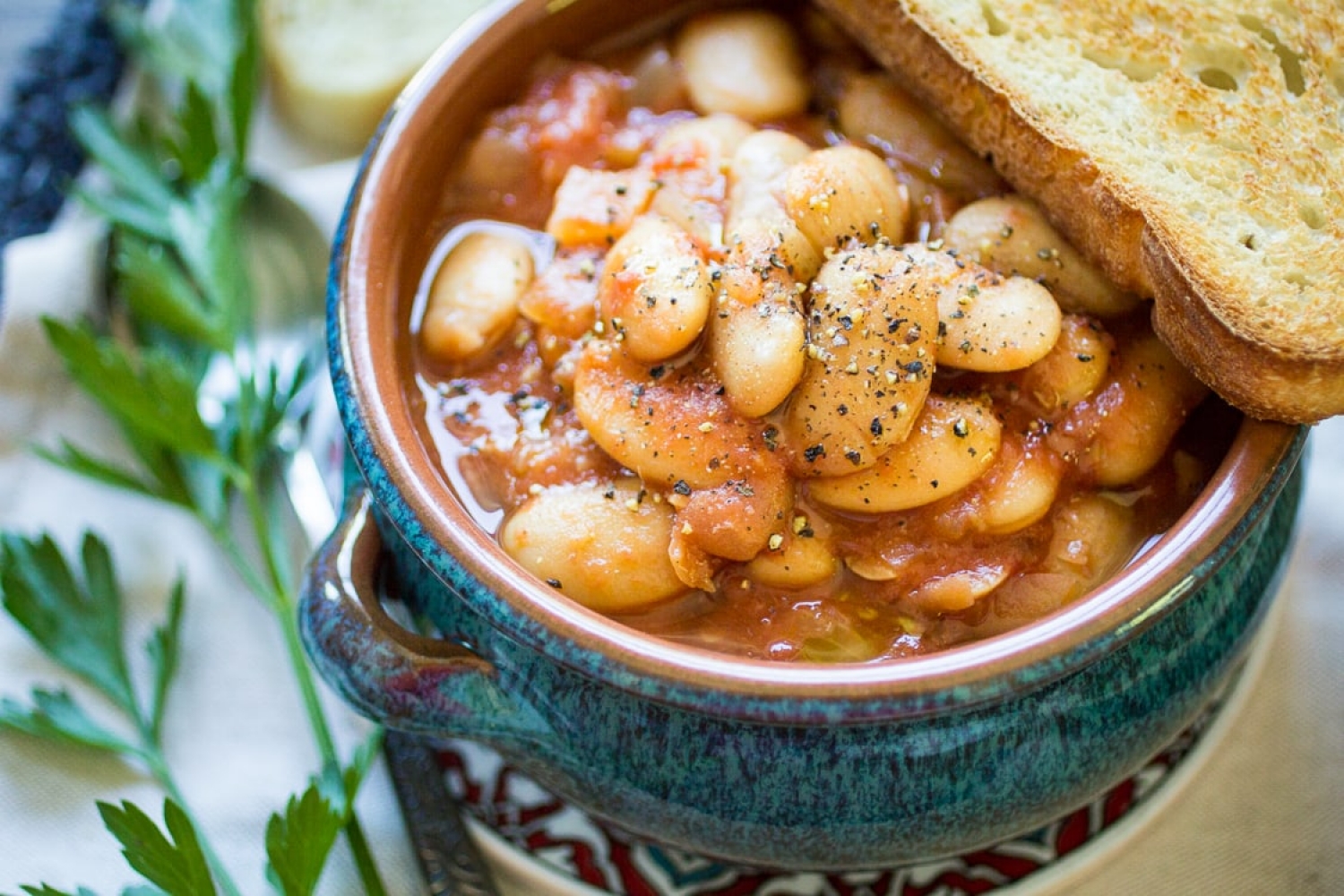 <p>For a taste of Greece on your plate, try <a href="https://thewanderlustkitchen.com/greek-gigantes/" rel="noopener">this no-fuss slow cooker recipe</a> made with Greek gigantes (giant beans) in a flavorful tomato sauce. If you can't find that bean variety, butter beans or lima beans can easily be swapped in. But they do have a unique flavor you'll love.</p>