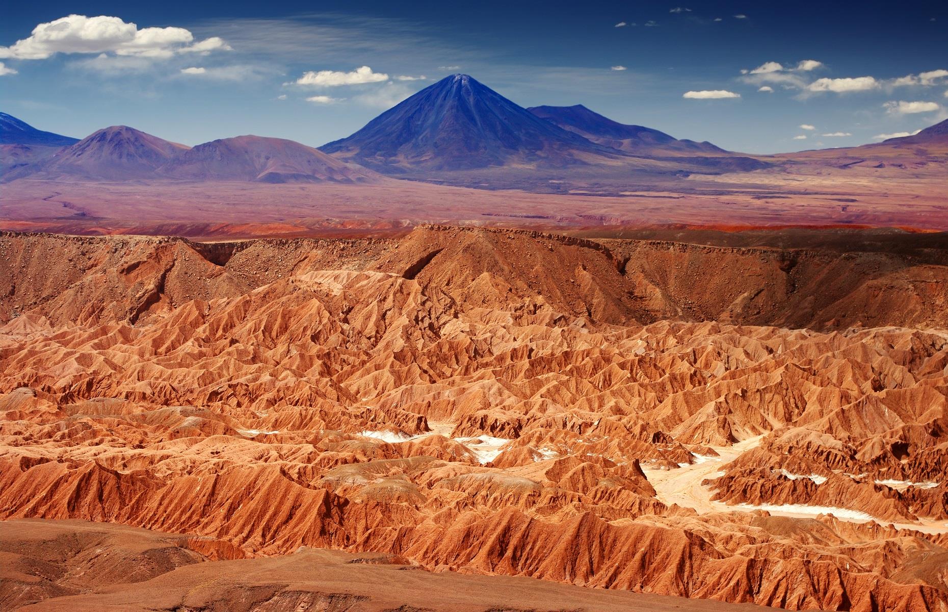 <p>Covering an area of almost 40,540 square miles (105,000sq km), the Atacama Desert is beautiful and vast in equal measure. From the Valley of the Moon, with its unique rocky ridges, to the Atacama Salt Flat, this spectacular plateau is a travel essential. Many directors seem to agree, because Chile's renowned desert has been captured in 50 different movies and documentaries, including <em>Spy Kids</em> and the James Bond franchise instalment <em>Quantum of Solace</em>.</p>