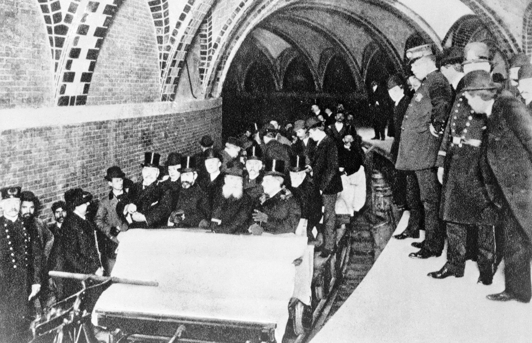 New York City's subway officially opened on 27 October 1904 and passengers rode the service in their thousands. This vintage snap shows city officials and business people embarking on the very first ride. The intricately tiled, vaulted ceilings of the completed City Hall station rise overhead.