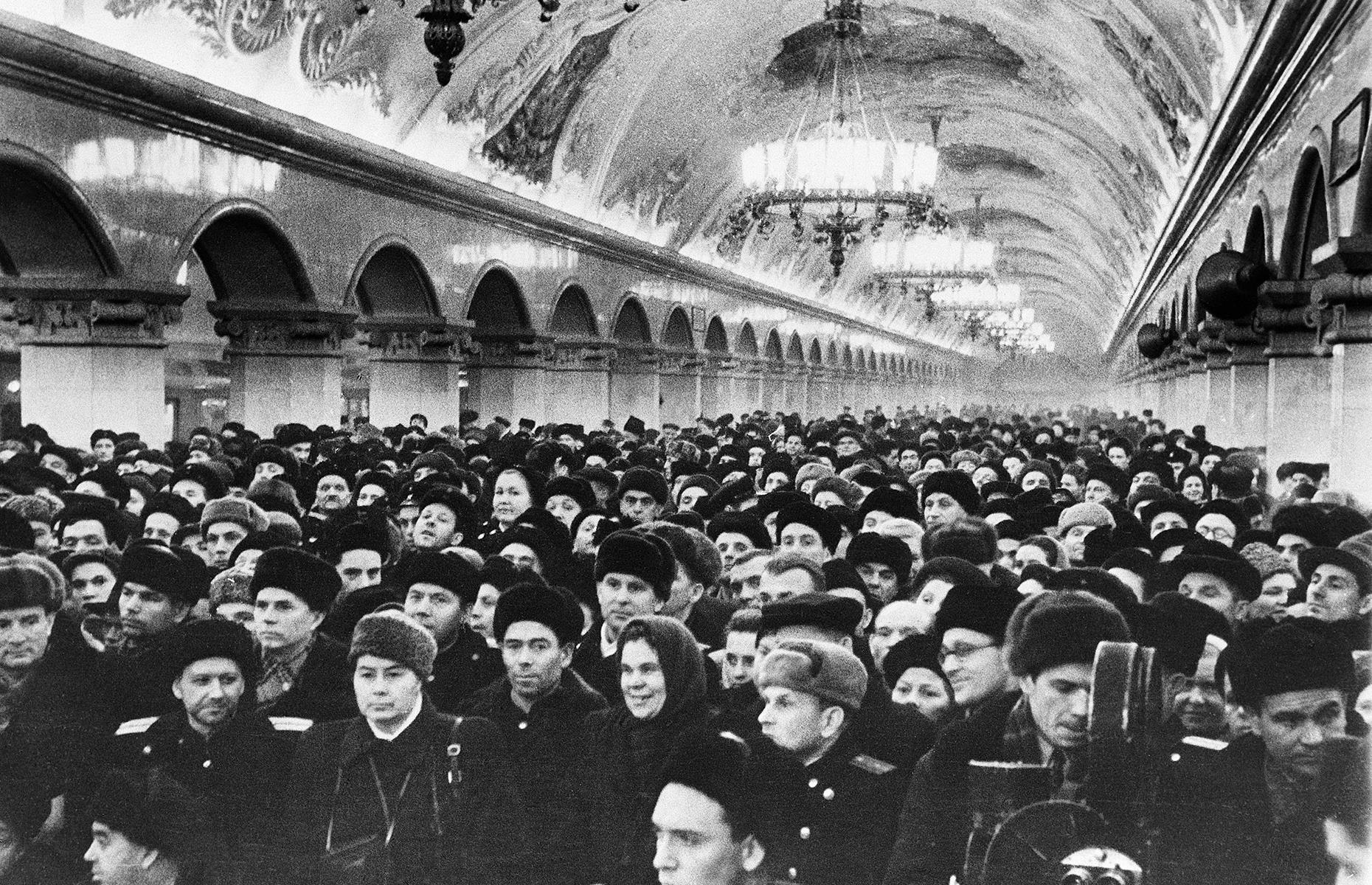 By the time this photo was taken, the Moscow Metro had been up and running for almost two decades. Here crowds gather at Komsomolskaya station in 1952 to celebrate the opening of a brand new section. In true Moscow style, the glittering station has intricate ceiling friezes, bold columns and arches, and chandeliers.