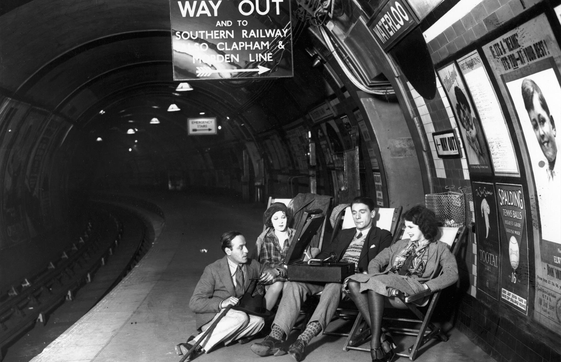 In normal times, London's tube stations are typically packed to the rafters. But it seems there was often a little more elbow room on platforms in the 1920s. Here, in 1928, a group of young people are papped listening to a gramophone on an empty platform at Waterloo underground station.