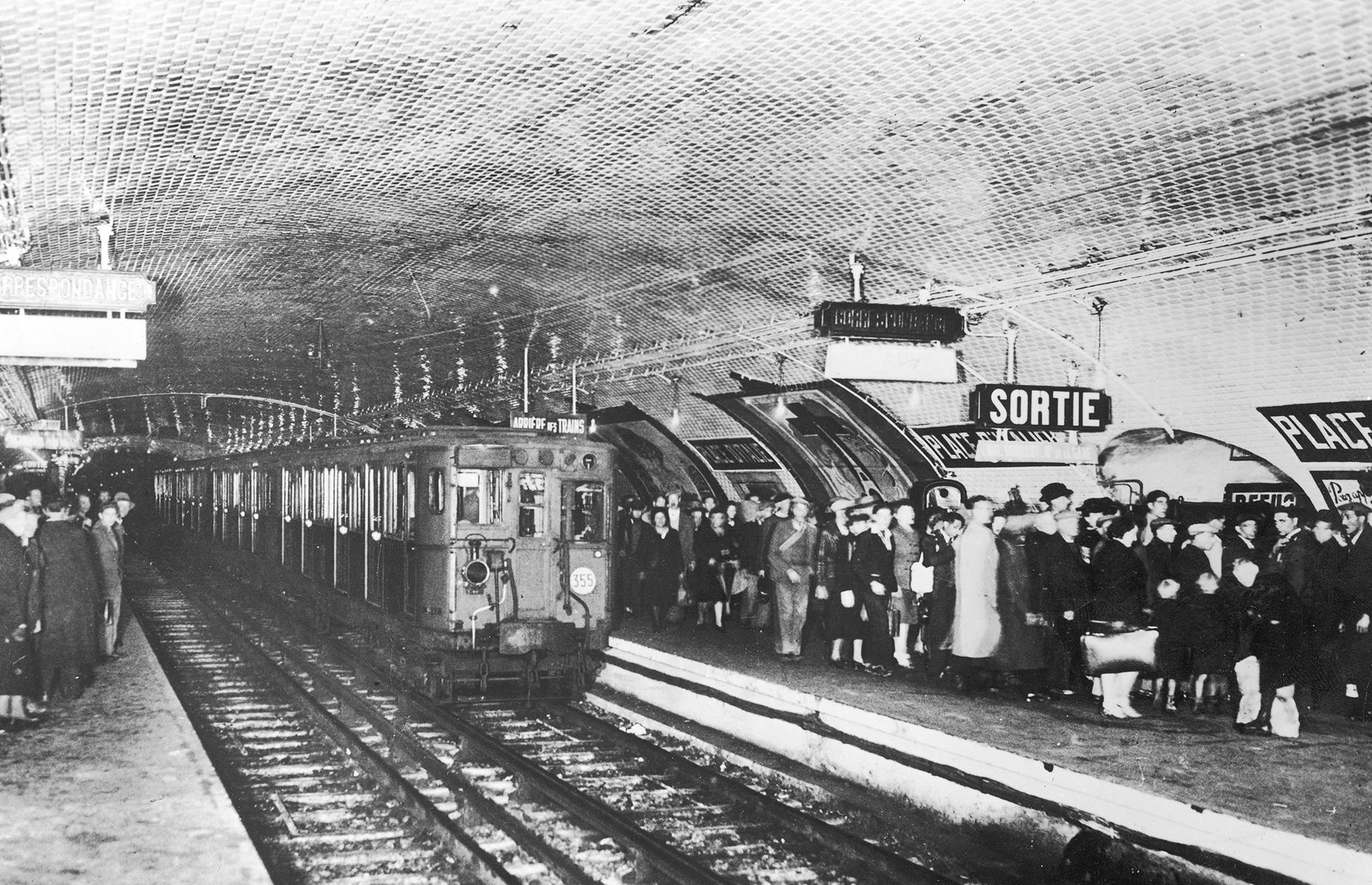 <p>Today, the Paris Métro, which opened right at the turn of the century, is renowned for its striking Art Nouveau-style subway entrances and its perpetual buzz – it's tipped as one of the busiest subway systems in the world. It's even bustling in this circa-1940 photograph. The shot shows the Place d'Italie metro station heaving with commuters.</p>  <p><strong><a href="https://www.loveexploring.com/galleries/82456/stunning-pictures-of-the-worlds-most-beautiful-train-stations">Marvel at these images of the world's most beautiful train stations</a></strong></p>