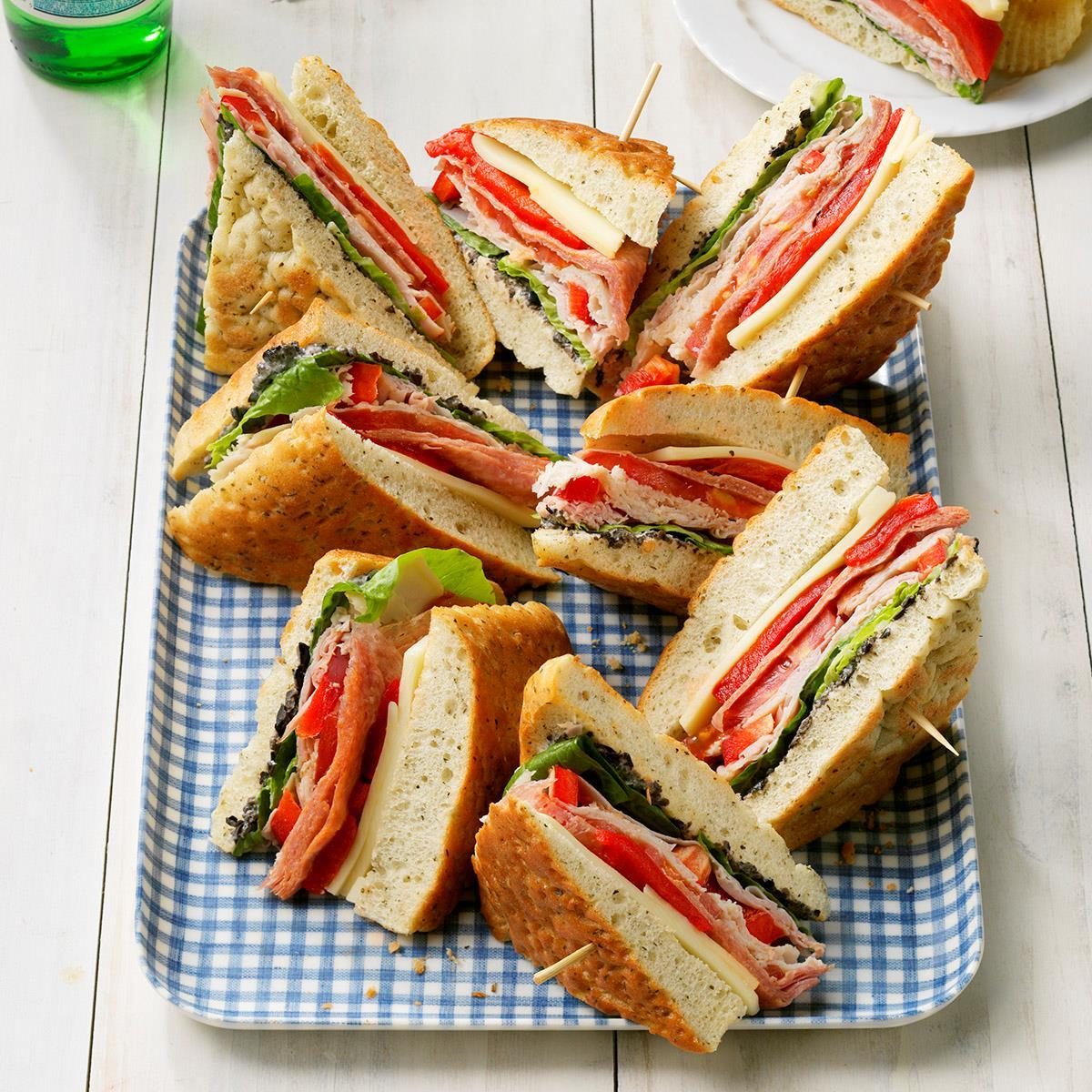 <p>Slices of this pretty sandwich make any casual get-together more speical. Add or change ingredients to your taste. —Peggy Woodward, Shullsburg, Wisconsin</p> <div class="listicle-page__buttons"> <div class="listicle-page__cta-button"><a href='https://www.tasteofhome.com/recipes/focaccia-sandwiches/'>Get Recipe</a></div> </div>