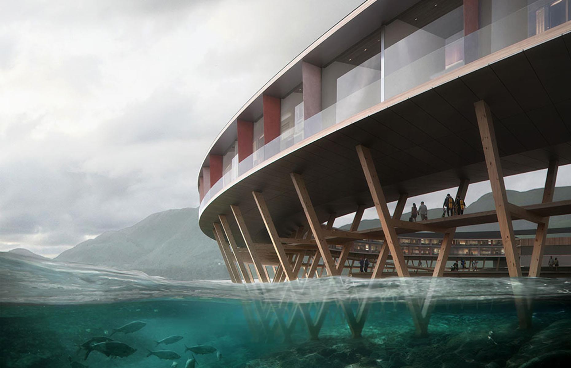The hotel’s design has nature at its heart. It was inspired by local architectural traditions like “rorbuer” – stilted cabins used seasonally by fishermen – and it juts out into the Holandsfjorden fjord, supported by weather-resistant wooden poles. It’ll be reached by an energy-neutral boat, that’ll shuttle guests to the hotel from the remote town of Bodø.