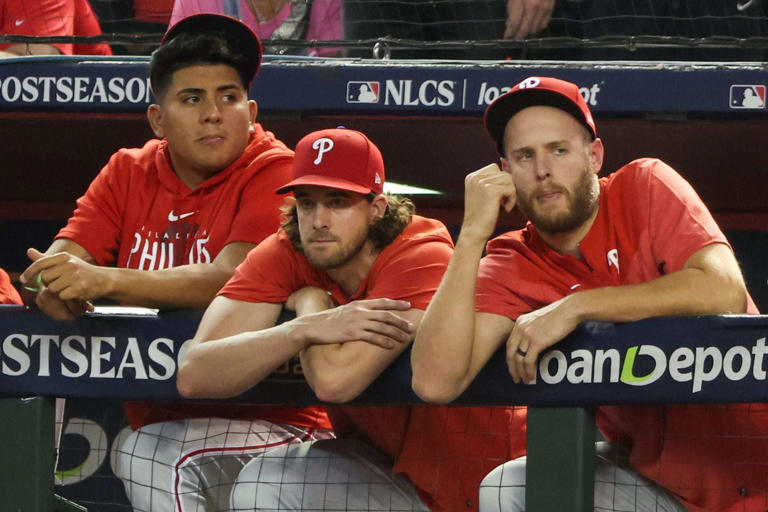Ranger Suarez (left) was the lone Phillies starter to go on the injured list last season, with Aaron Nola (center) and Zack Wheeler making 32 starts apiece.