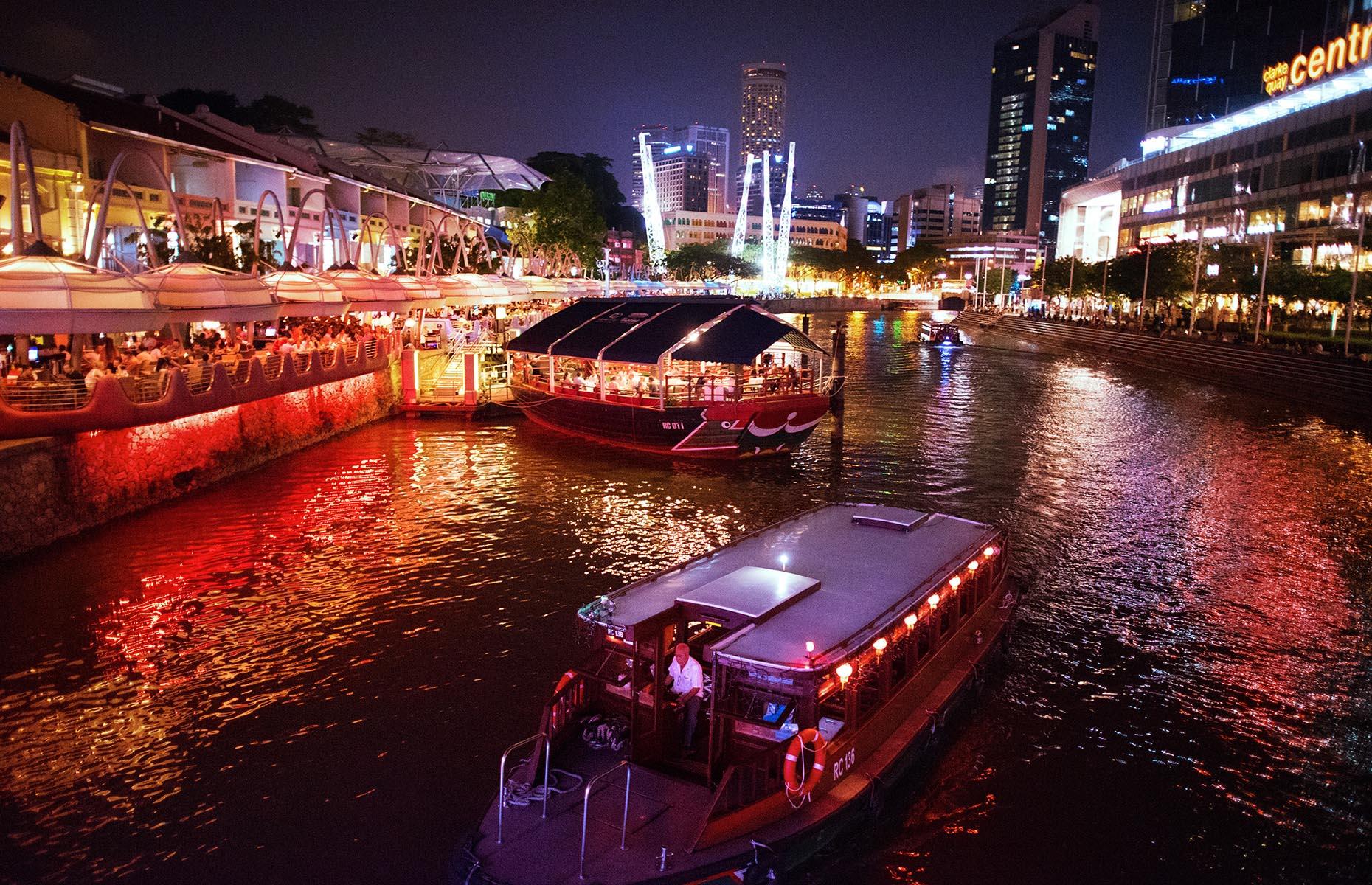 <p>Another historical riverside spot where merchants would trade decades ago, Clarke Quay has been transformed into a colourful array of converted warehouses where you’re more likely to go clubbing than crabbing. Restaurants, pubs and clubs – some of which are on static boats – thrive when the sun goes down and there’s nothing better than enjoying a drink while watching the river cruises sail past.</p>