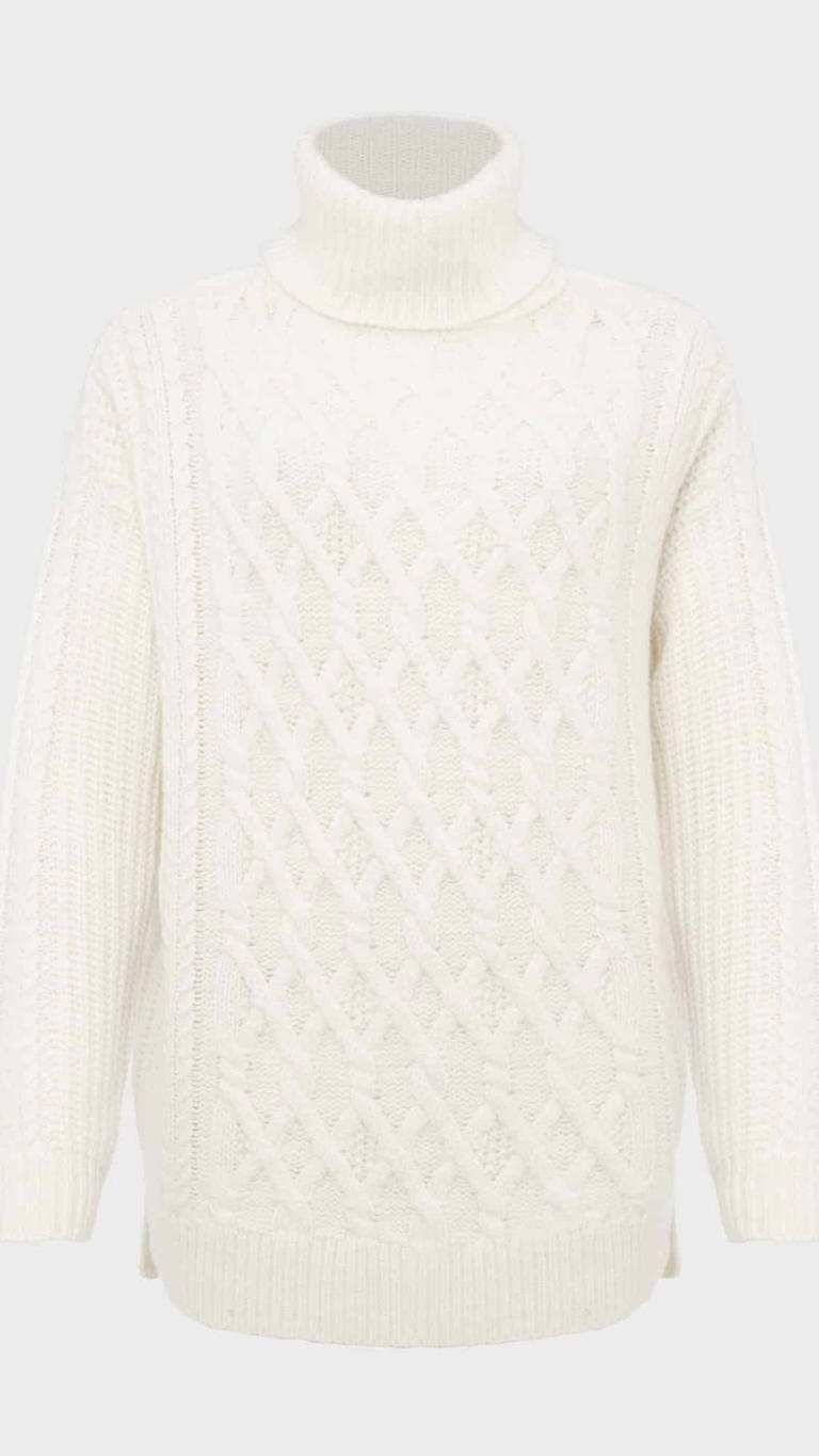 Claudia Winkleman's cable knit Traitors jumper reminds us of When Harry ...