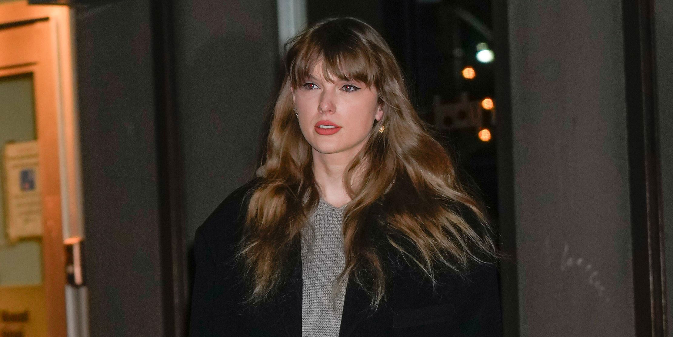 Taylor Swift Steps Out in a Cozy Cashmere Dress