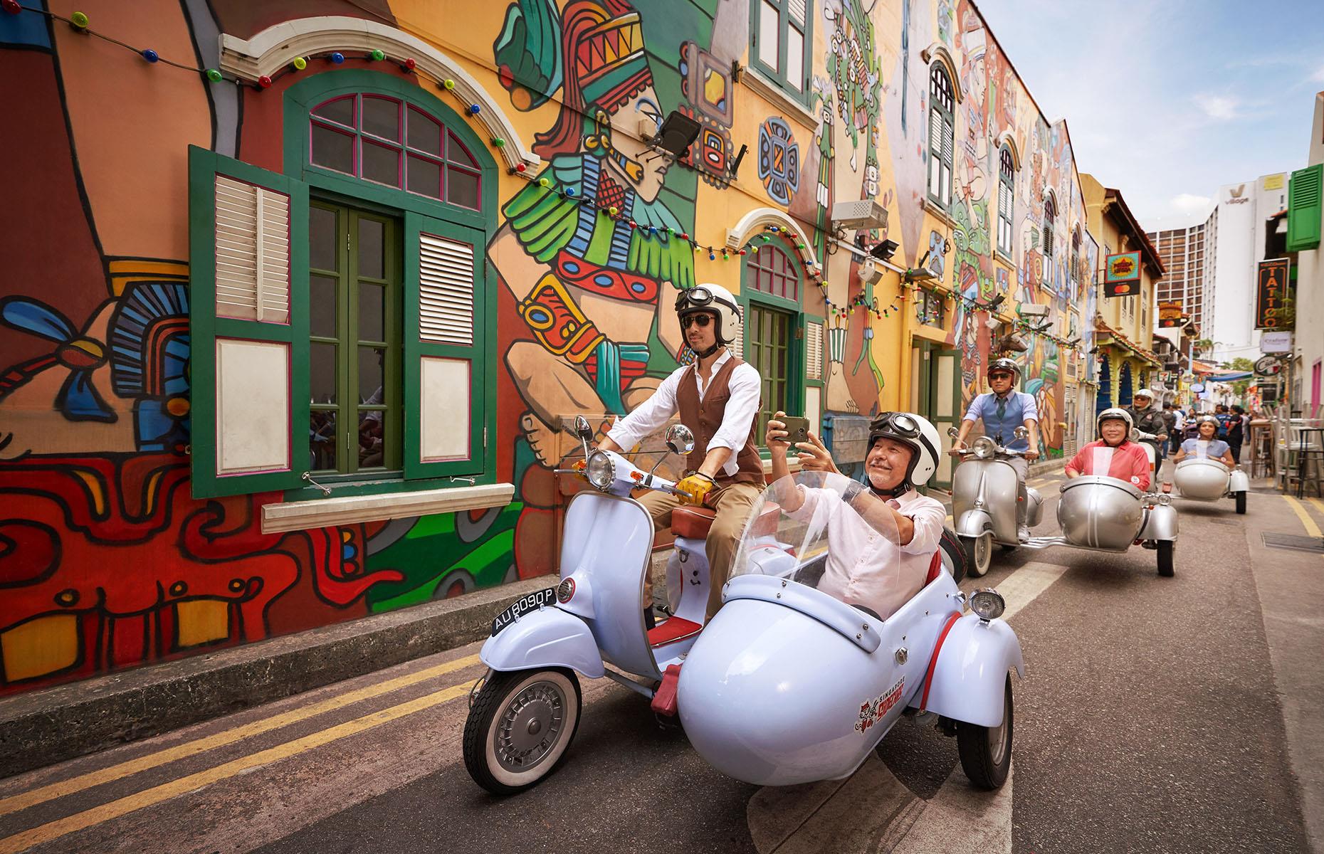 <p>For a unique way of seeing Singapore, take a <a href="https://www.sideways.sg/">sidecar tour</a> by night. The brainchild of Simon Wong, this Vespa adventure will whip you around different neighbourhoods and you'll get to choose your route, which can include heritage sites, the island’s landmarks or specific areas such as the beautiful Muslim Quarter, Kampong Gelam. Lasting from one to three hours, you’ll cover a lot of Singapore. Strangers will give you a wave from the sidewalks and if you spot a photo opportunity, fear not, your dedicated rider will happily stop for a snap.</p>