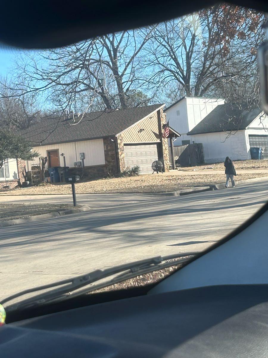 Caught this young girl taking a package, and discarding it a few houses ...