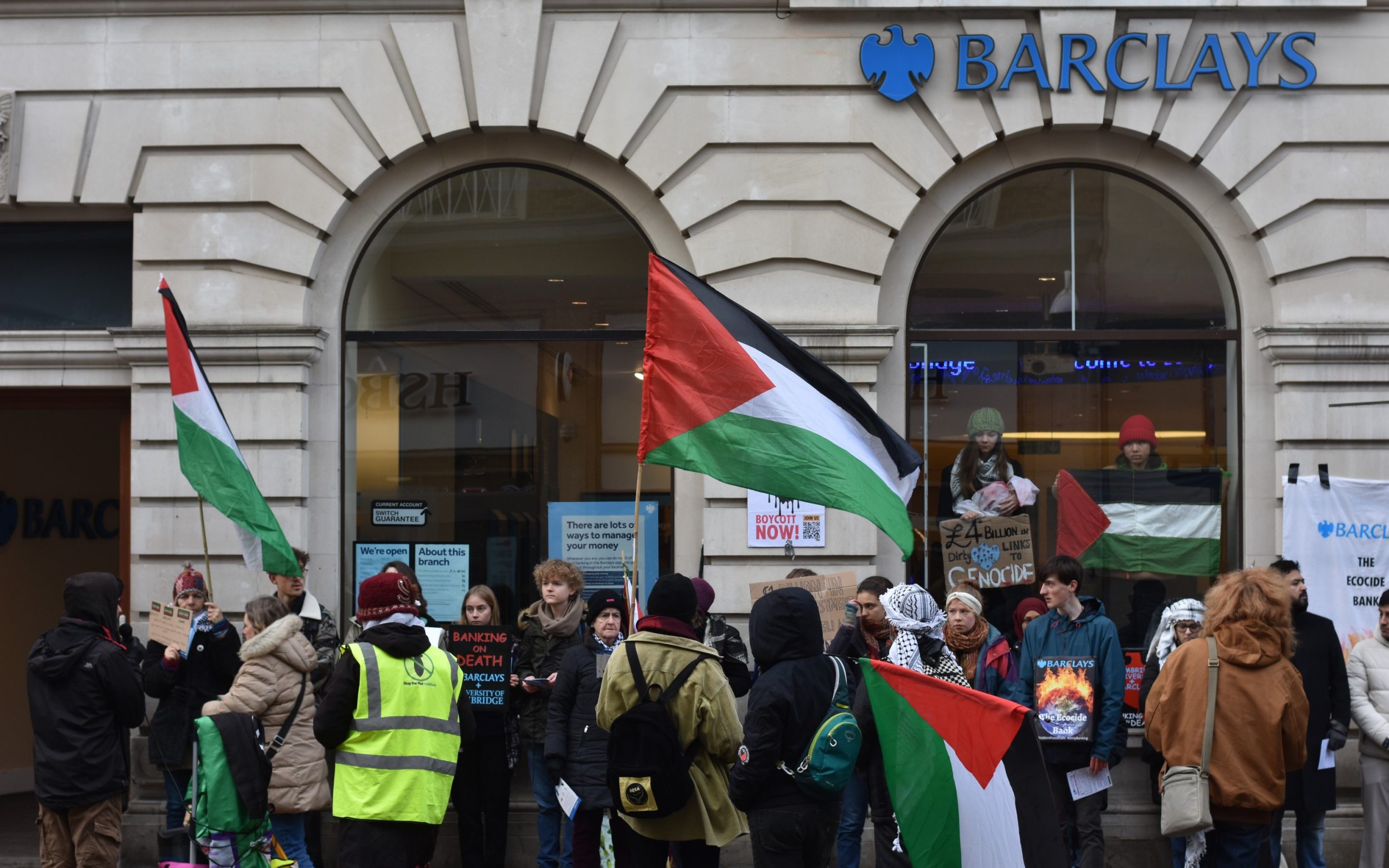 cambridge students stage ‘die-in’ at barclays bank to protest against israel and fossil fuels