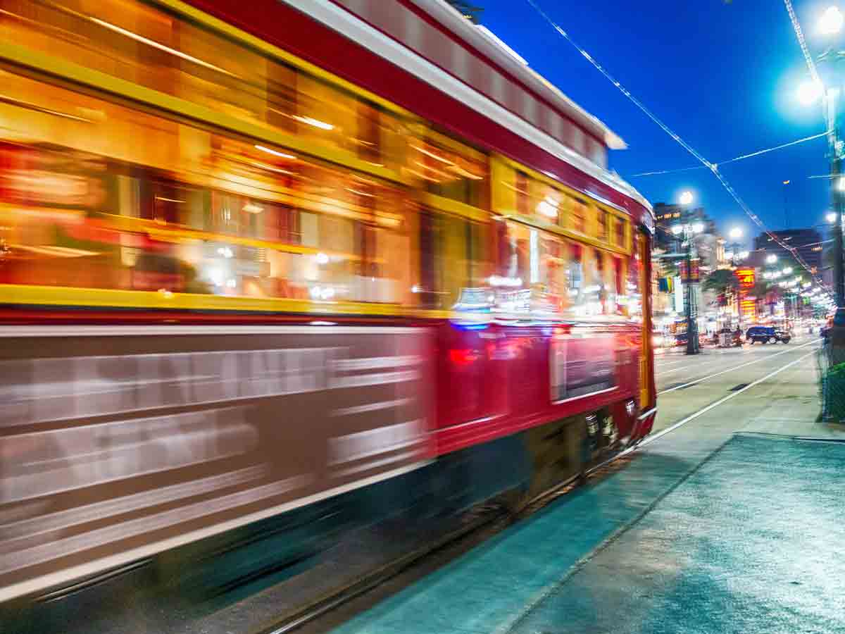 <p>One of the essential things to do in New Orleans is to ride its historic streetcar, which opened in 1834 and is the oldest in service in the world. It’s a convenient, glamorous, and inexpensive way to get to know the city, as the streetcar passes through the French Quarter and many other parts of New Orleans. </p> <p>Pass through St. Charles and Carrollton avenues, which are symbolic of New Orleans’s romance and charm. This particular line is the oldest continuously operating street tram system in the world—opening as steam-powered and horse-drawn in 1835 and converting to electricity in 1893. You can also pass through the Central Business District, City Park, and the New Orleans Museum of Art.</p>